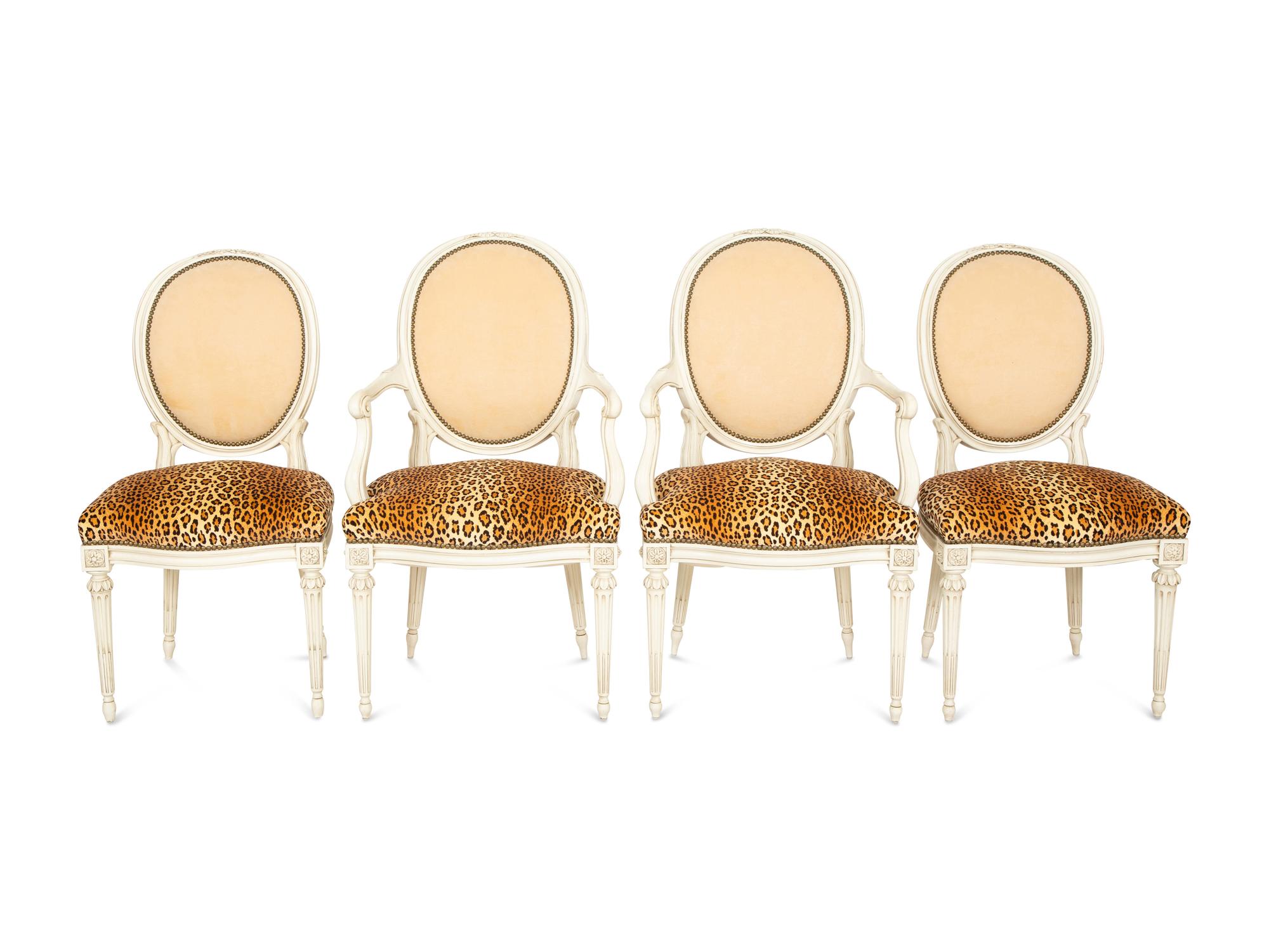 A Set of Eight Louis XVI Style Painted Oval-Back Dining Chairs
