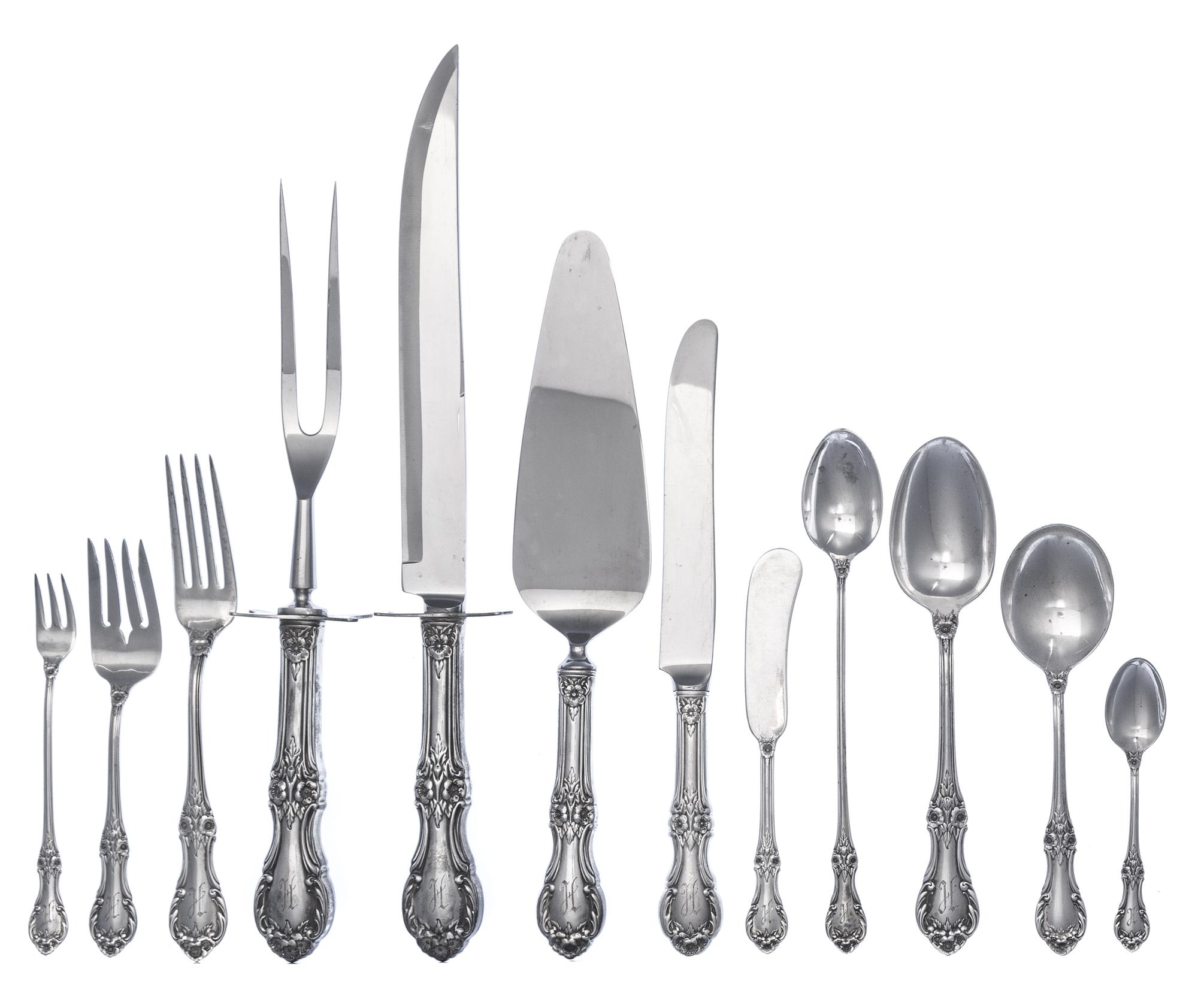 An American Silver Flatware Service, International Silver Co., Meriden, CT, Wild Rose pattern, comprising: 12 dinner knives 8 dinner fo