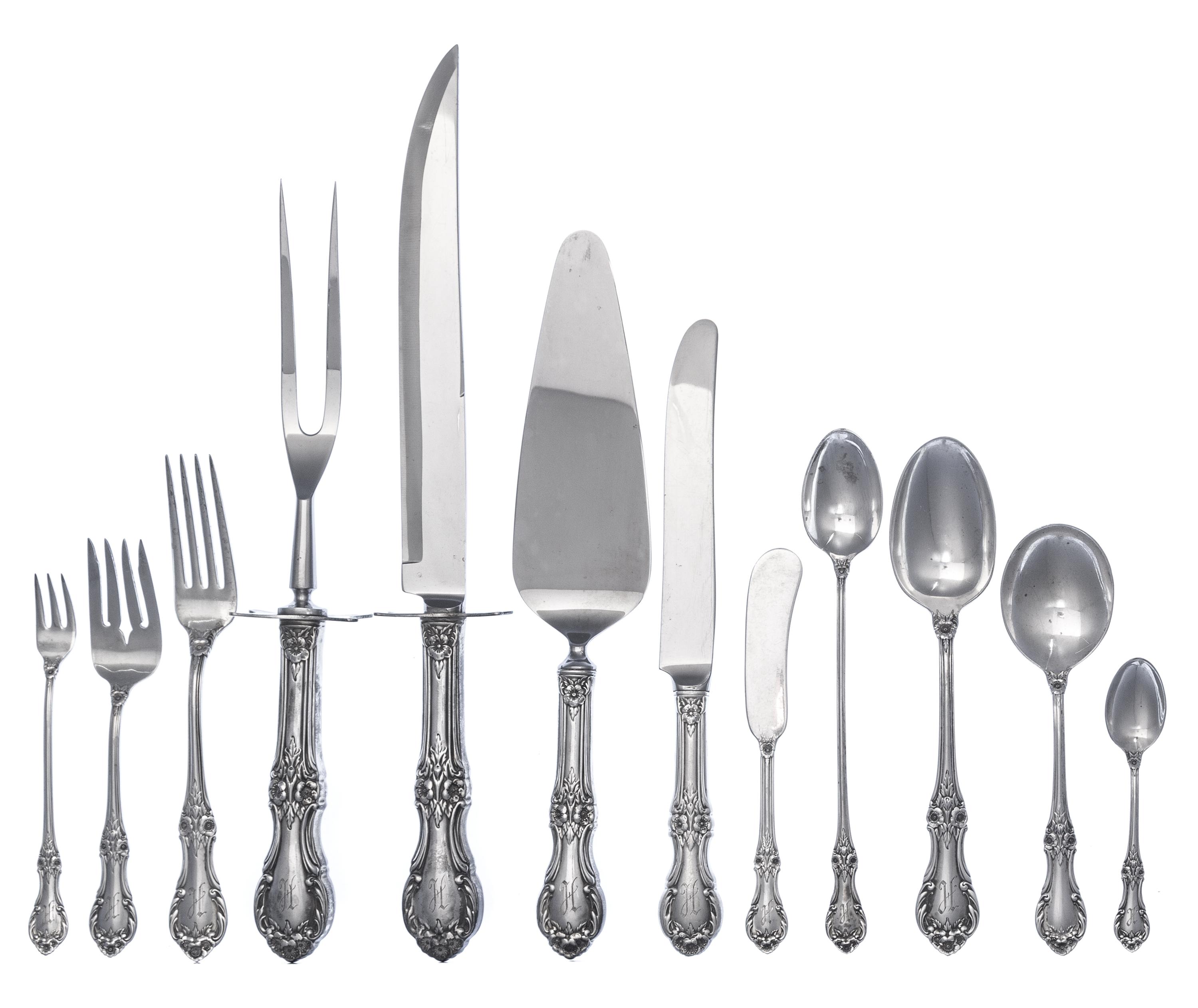 An American Silver Flatware Service, International Silver Co., Meriden, CT, Wild Rose pattern, comprising: 12 dinner knives 8 dinner fo