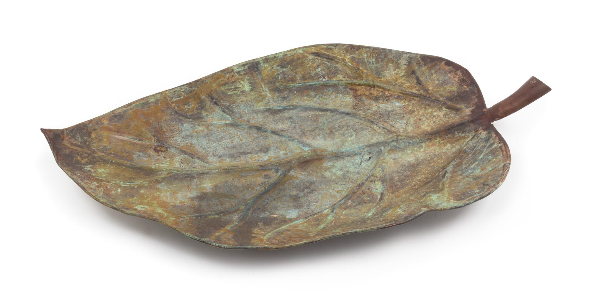 A Patinated Metal Serving Tray Length 24 3/4 inches.