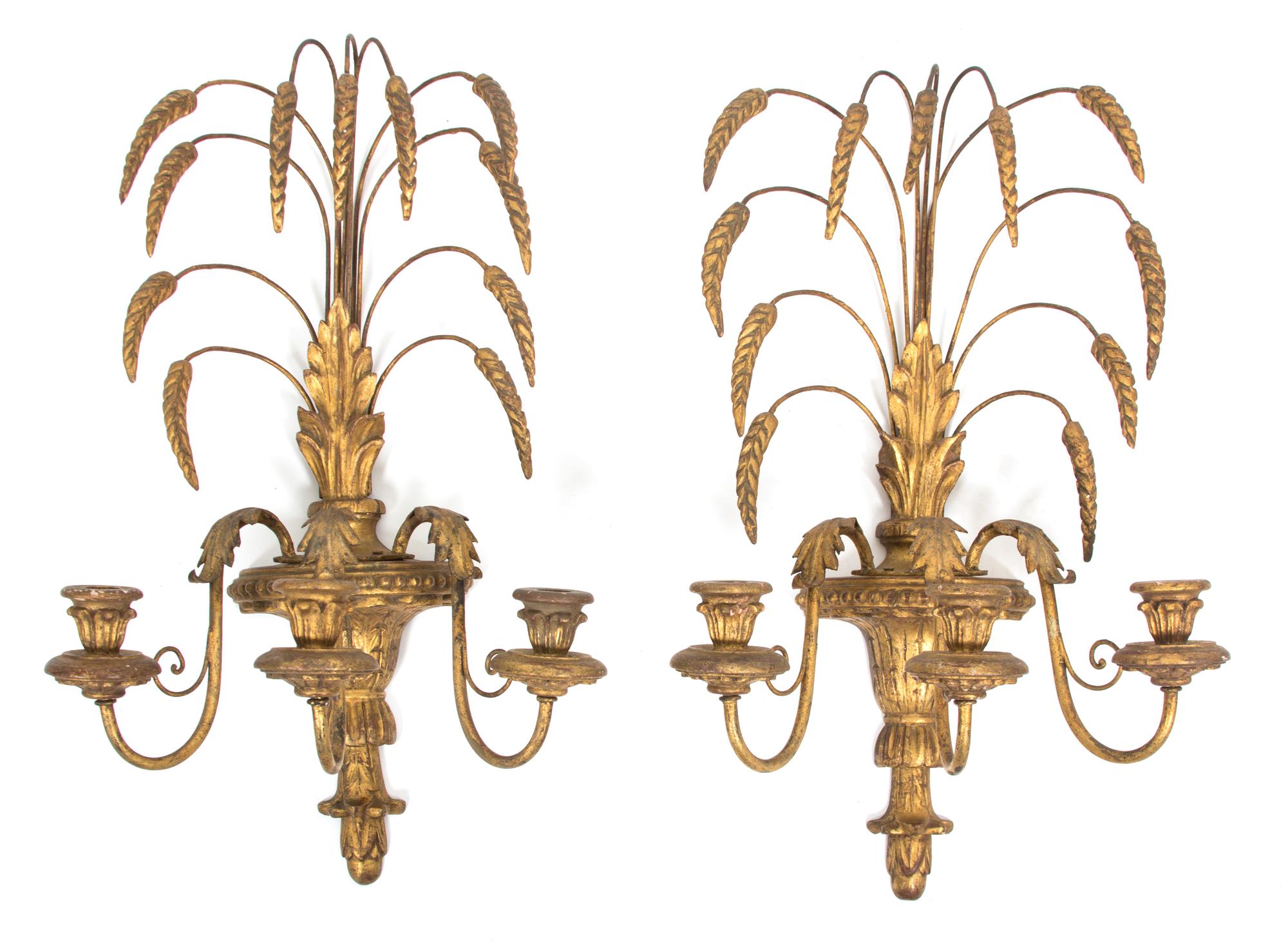 A Pair of Louis XV Style Carved Giltwood and Gilt Metal Three-Light Wall Sconces Height 21 x width 13 inches. — 20TH CENTURY