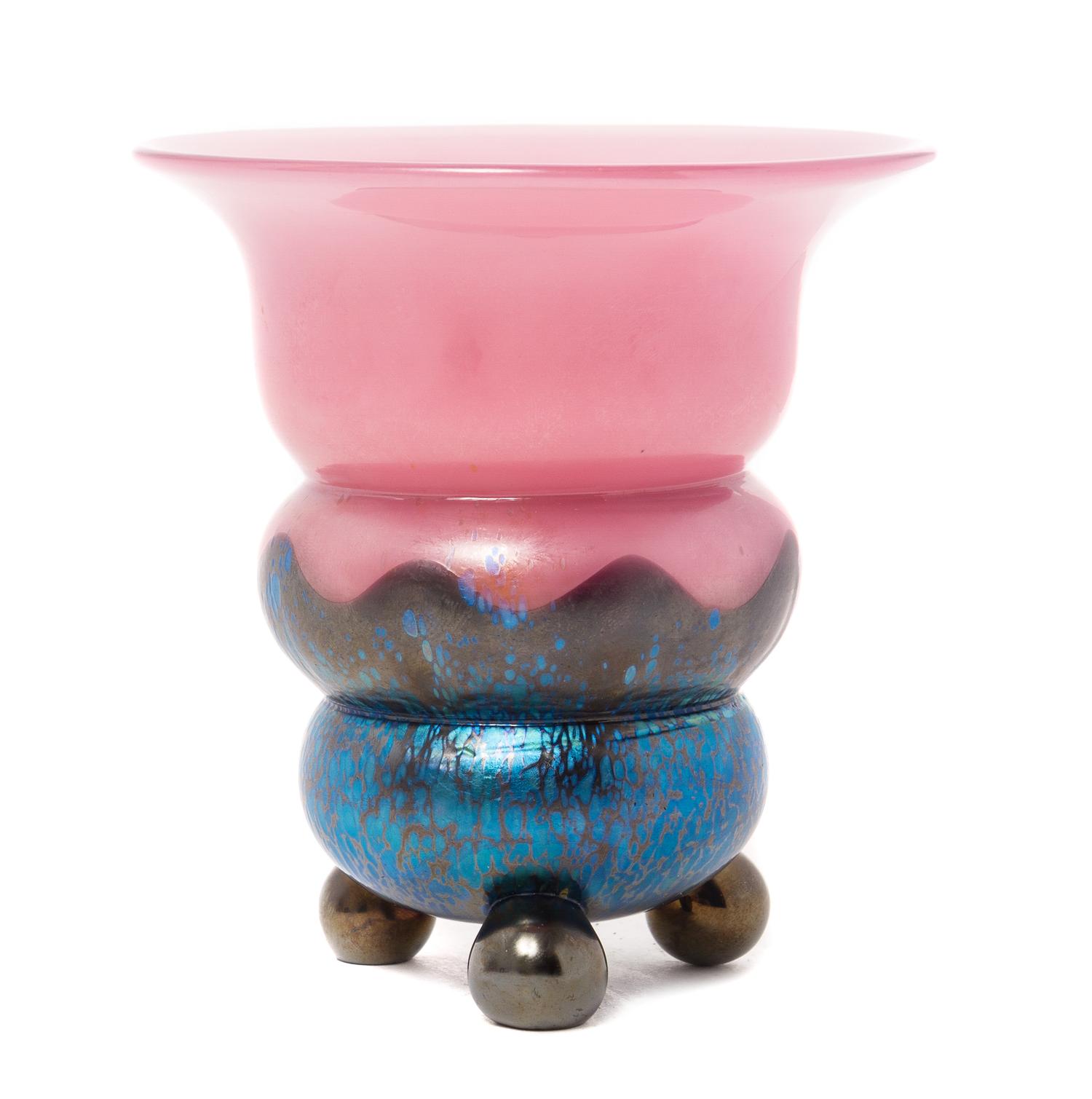 An Iridescent Glass Vase Height 4 1/2 inches.
