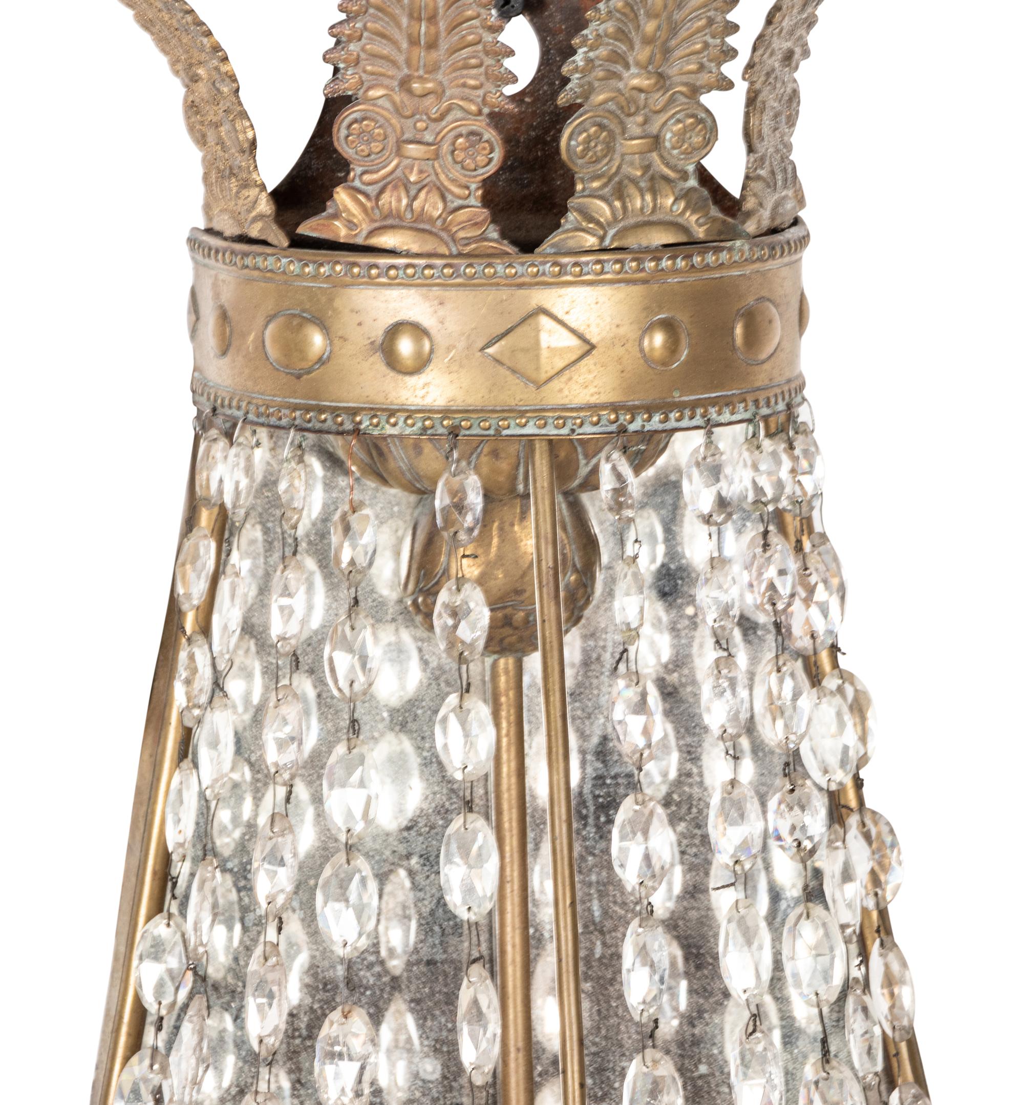A Pair of Regency Style Silvered Tôle and Glass Five-Light Wall Lights