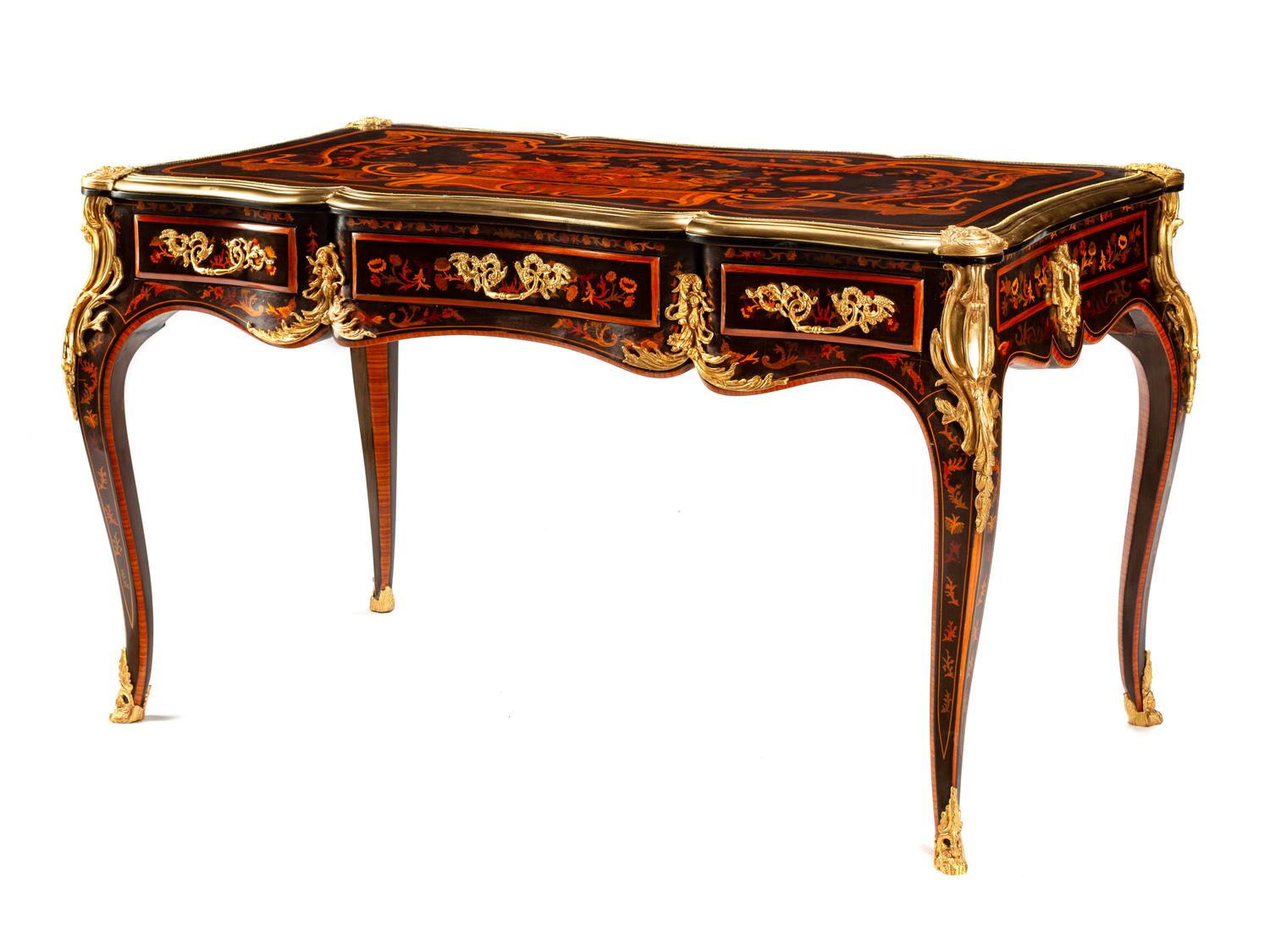 A Louis XV Style Gilt Bronze Mounted Marquetry Bureau Plat