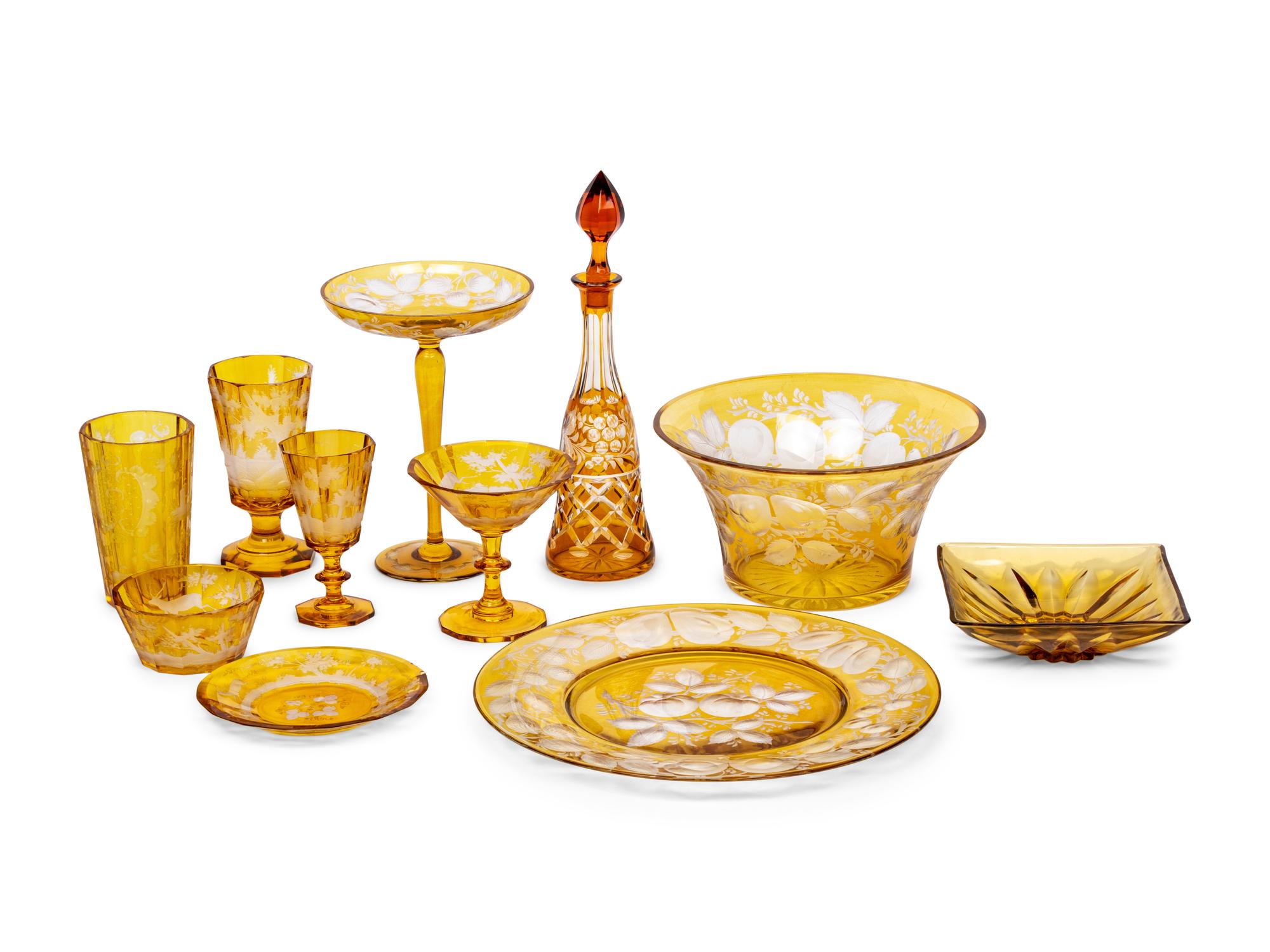 A Bohemian Amber Etched Glass Table Service