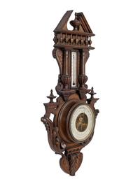 A French Carved Walnut Wheel Barometer