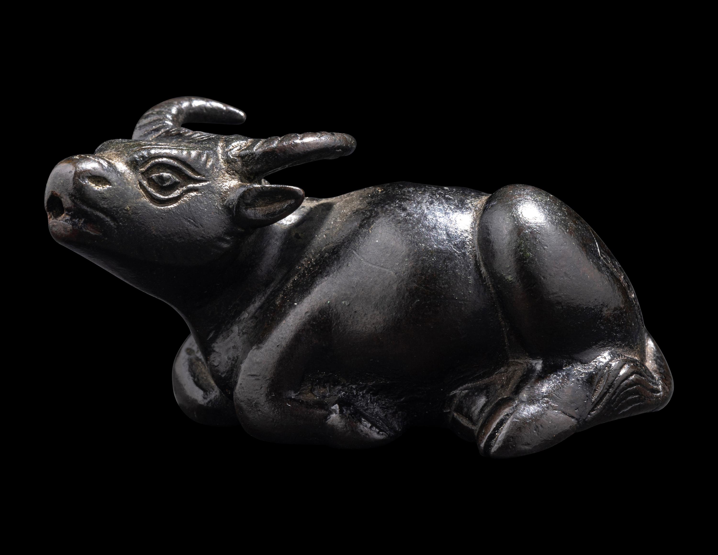 A Small Chinese Bronze Ox-Form Water Dropper