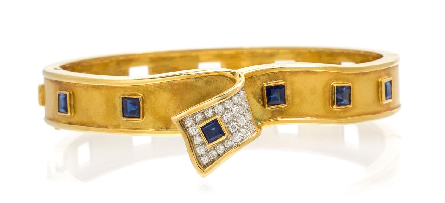 A Yellow Gold, Sapphire and Diamond Bangle Bracelet, 25.00 dwts.