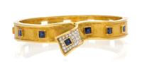 A Yellow Gold, Sapphire and Diamond Bangle Bracelet, 25.00 dwts.