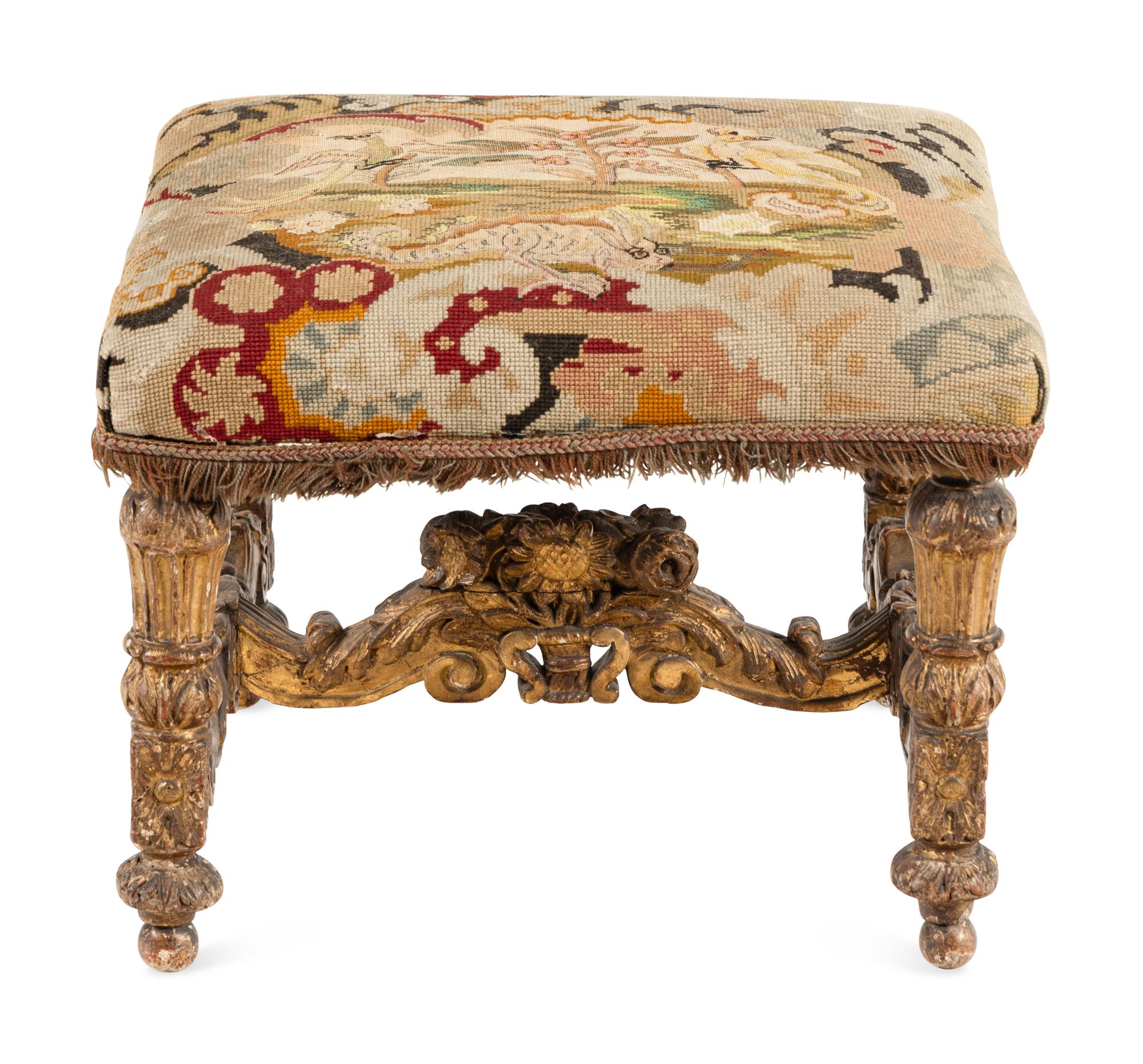 A Giltwood Stool with Needlepoint Upholstery