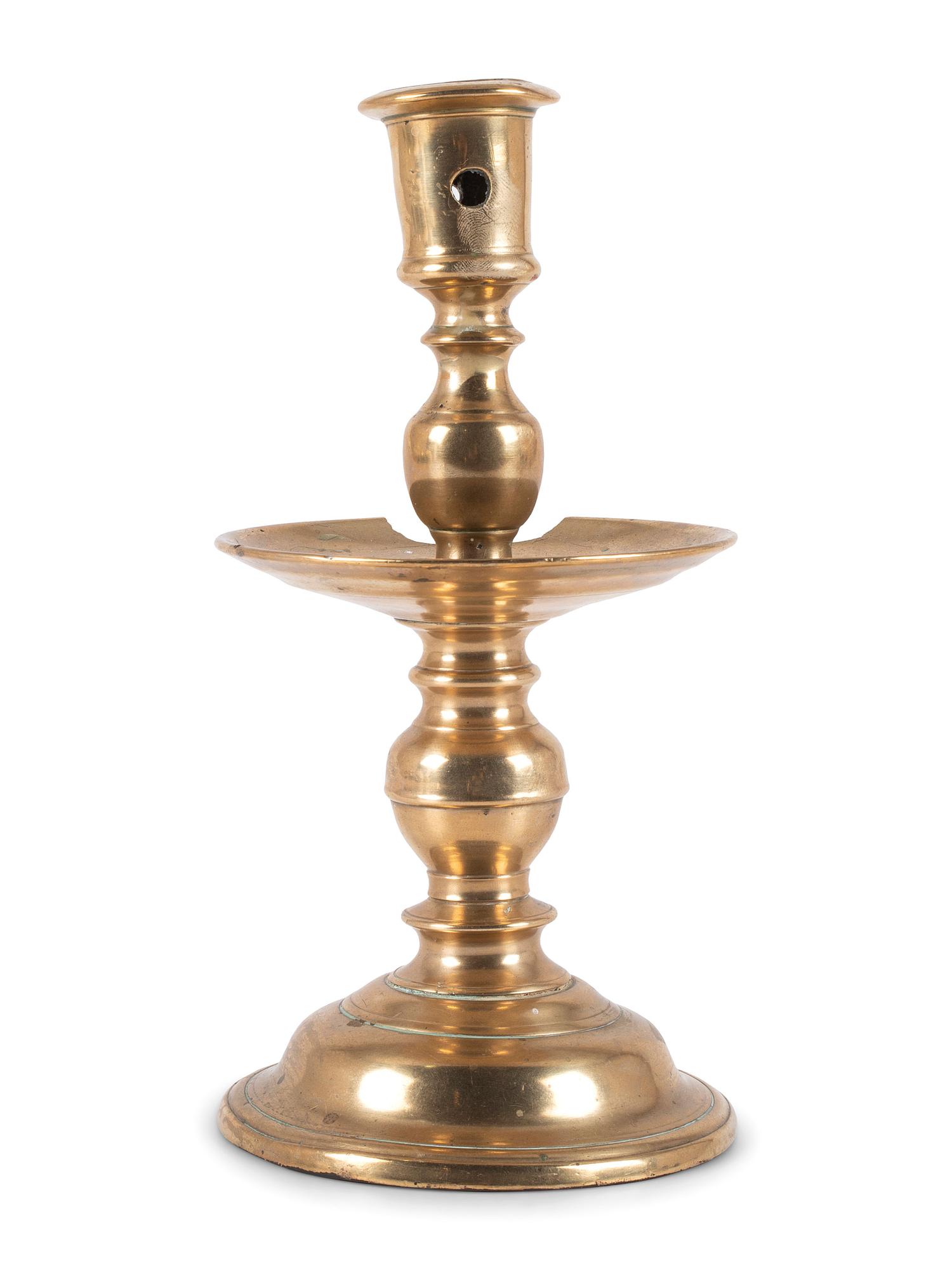 A Dutch Brass Heemskerk Candlestick