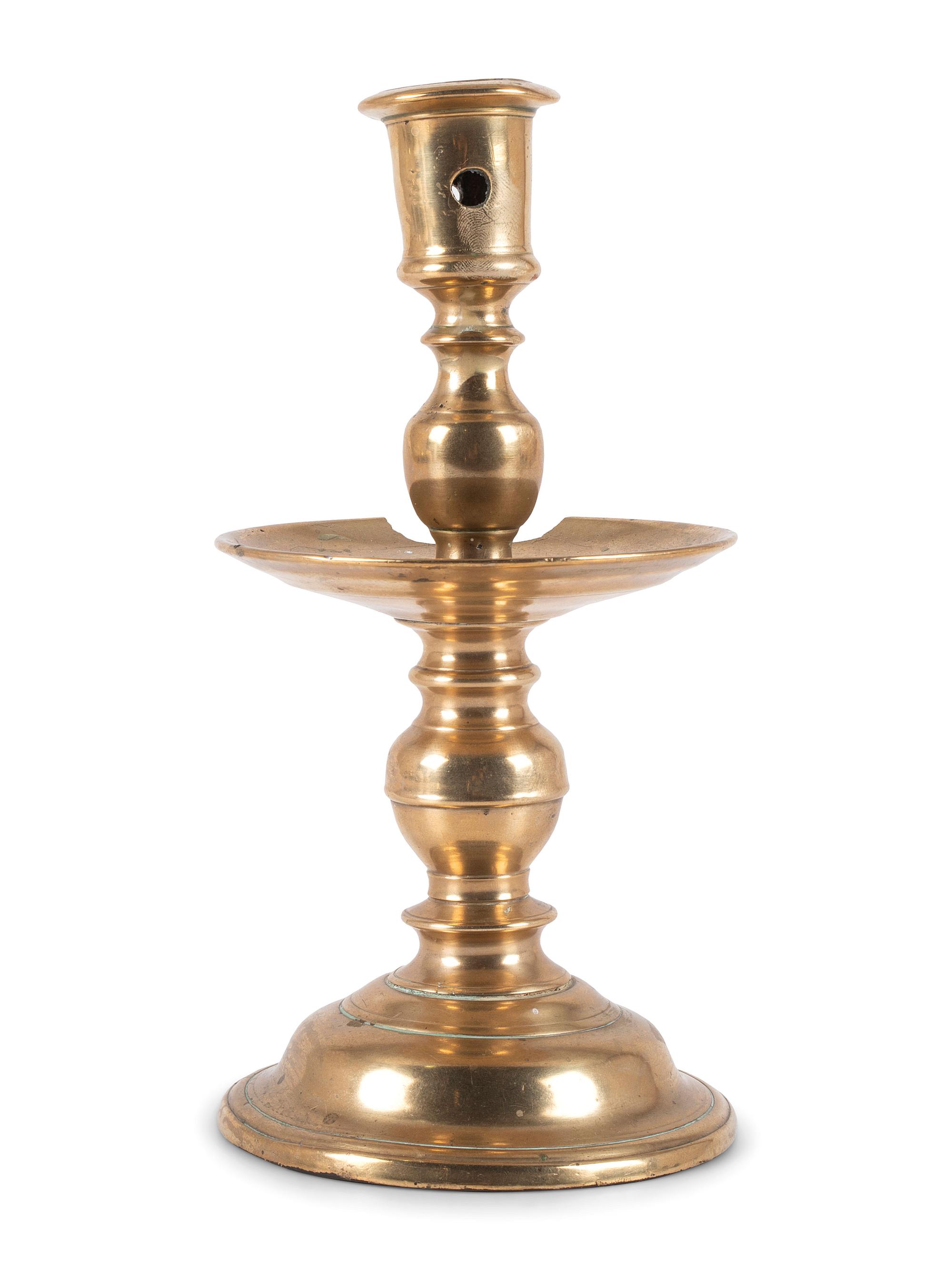 A Dutch Brass Heemskerk Candlestick