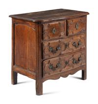 A Louis XV/XVI Provincial Walnut Chest of Drawers
