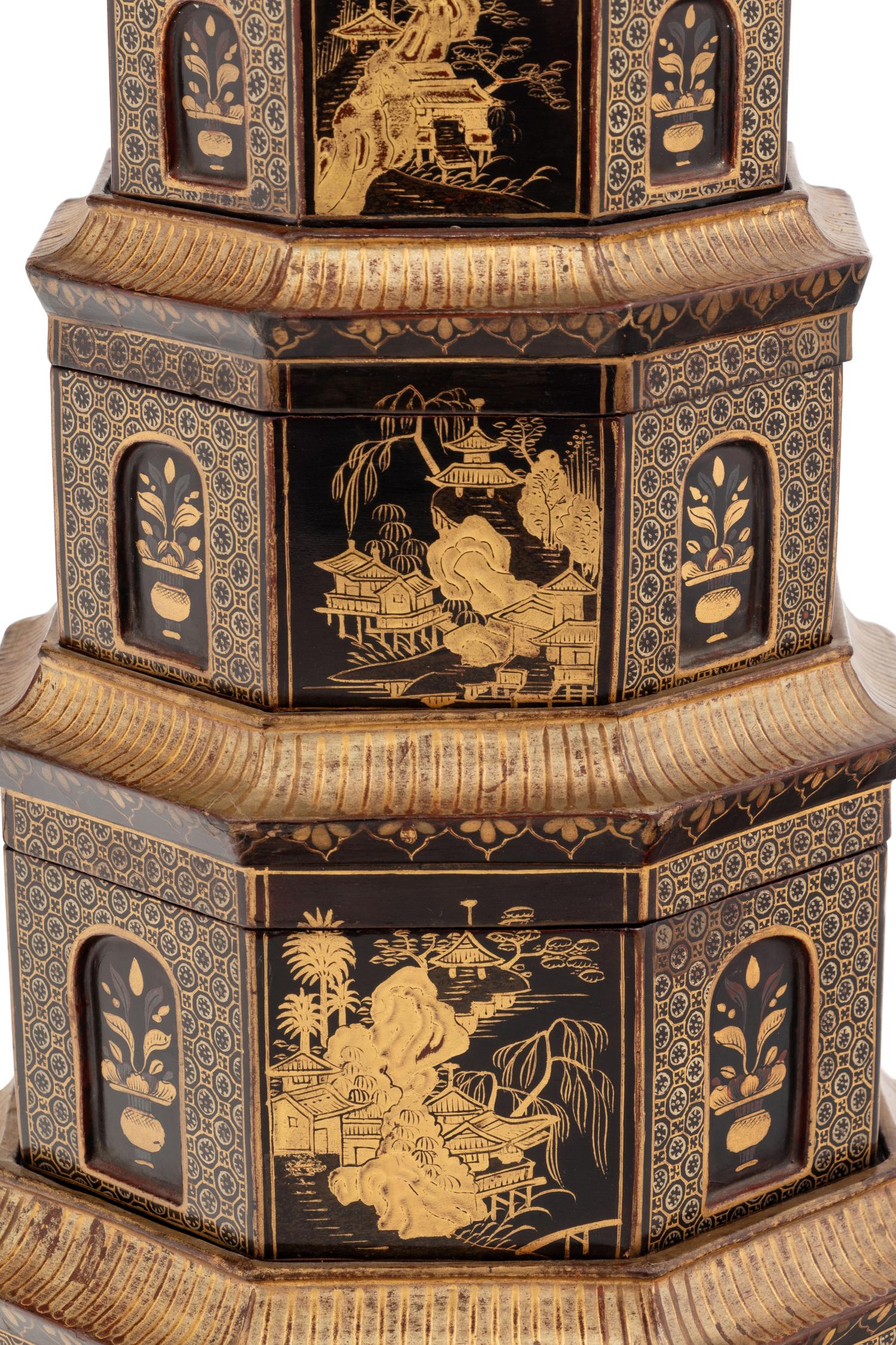 A Chinese Export Black and Gilt Lacquer Pagoda-Form Stacking Container