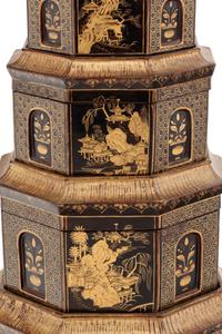 A Chinese Export Black and Gilt Lacquer Pagoda-Form Stacking Container