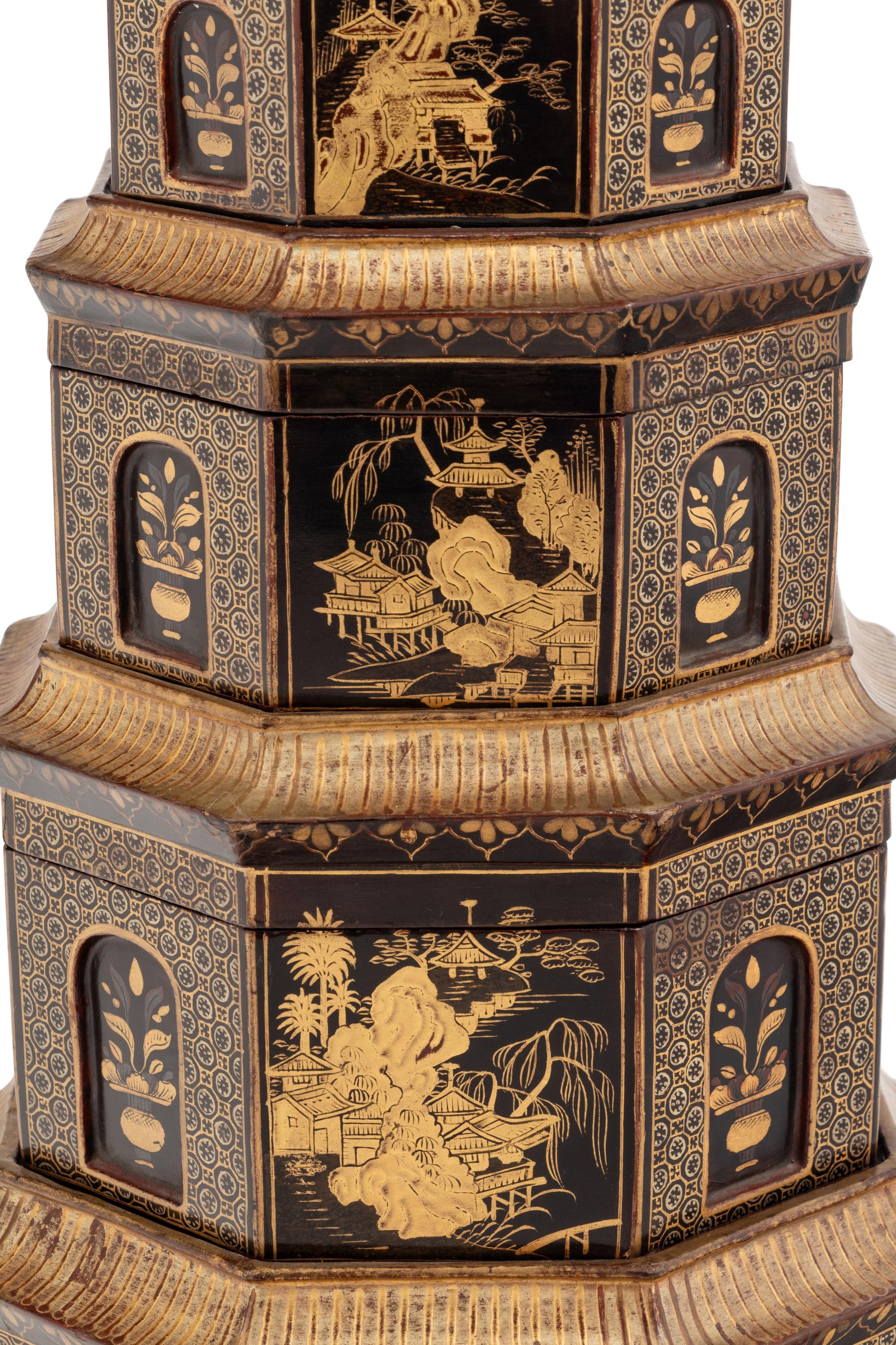 A Chinese Export Black and Gilt Lacquer Pagoda-Form Stacking Container