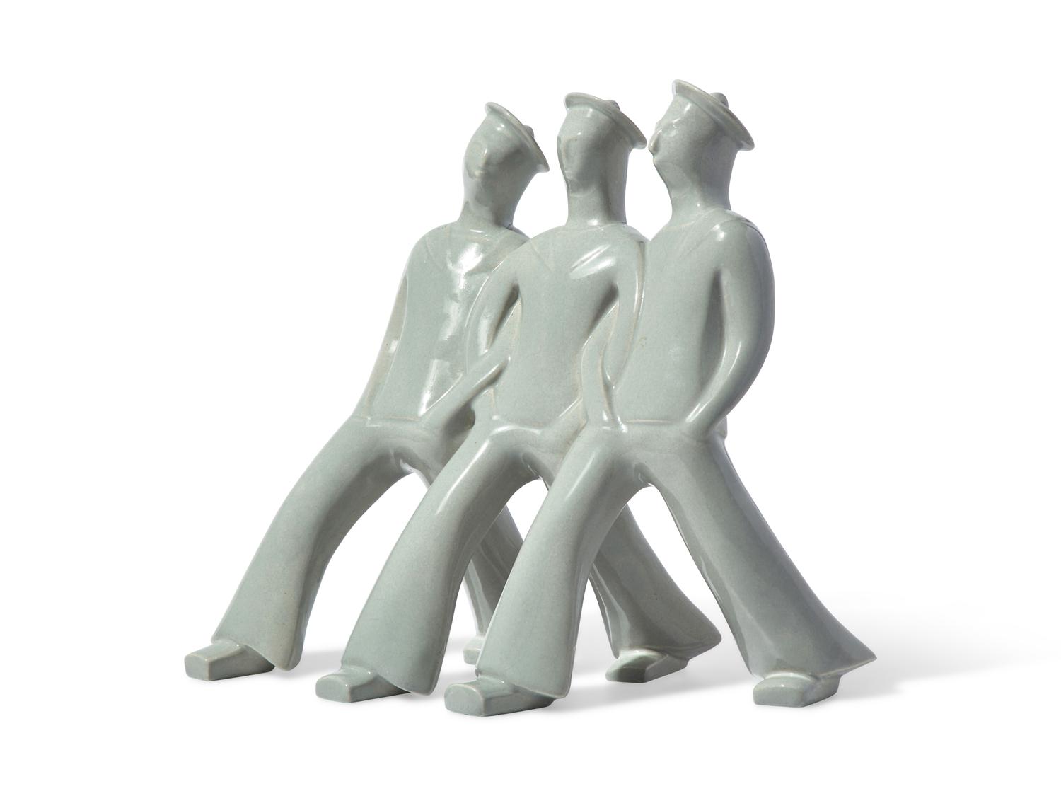 A French Art Deco Earthenware Figure Group of Three Sailors on the March