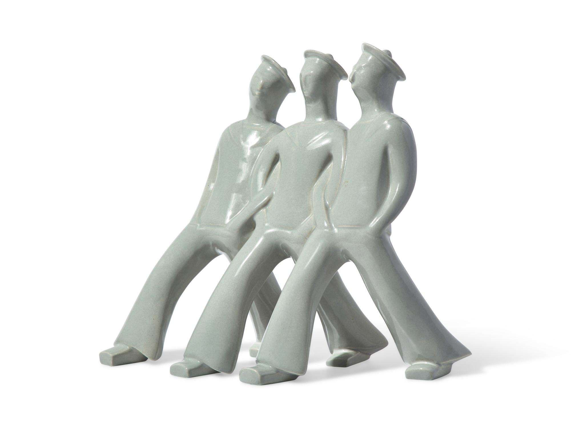 A French Art Deco Earthenware Figure Group of Three Sailors on the March
