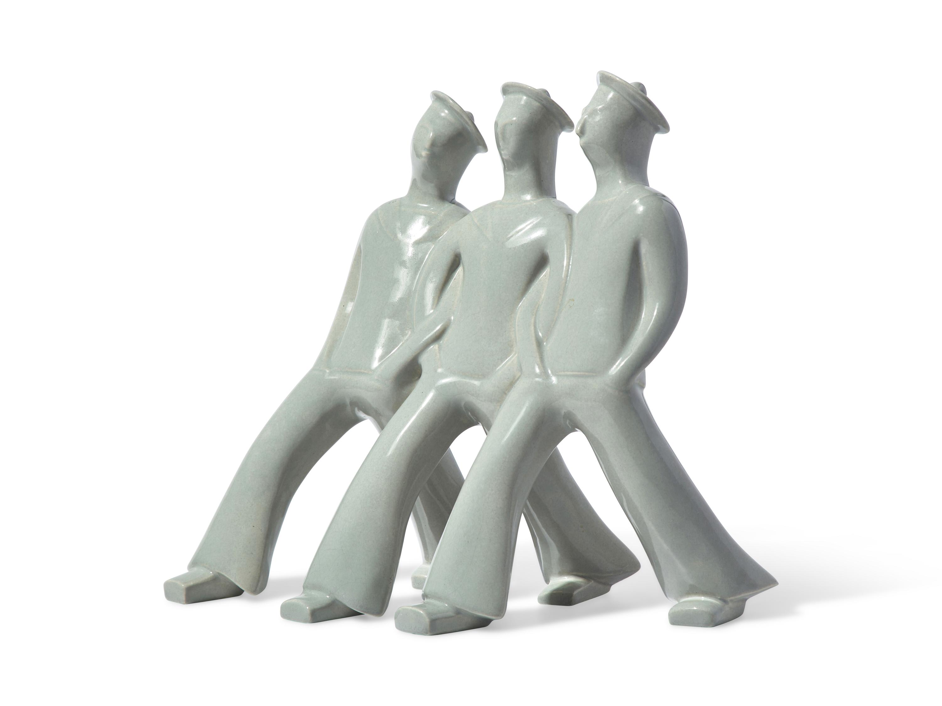 A French Art Deco Earthenware Figure Group of Three Sailors on the March