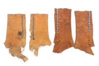 Two Pairs of Navajo Deer Skin Leggings Length of longer: 15 1/2 inches.