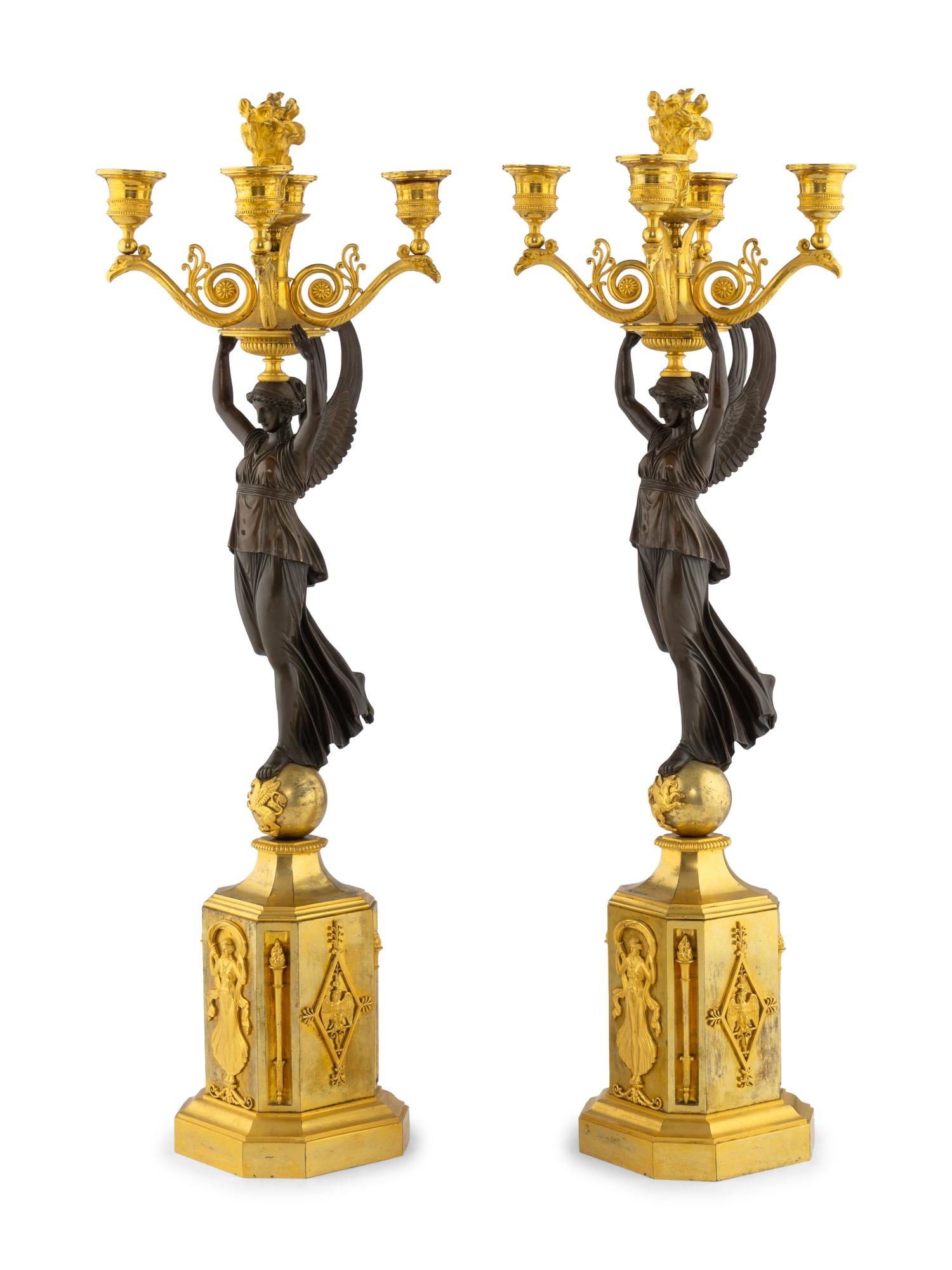 A Pair of Empire Gilt and Patinated Bronze Four-Light Candelabra