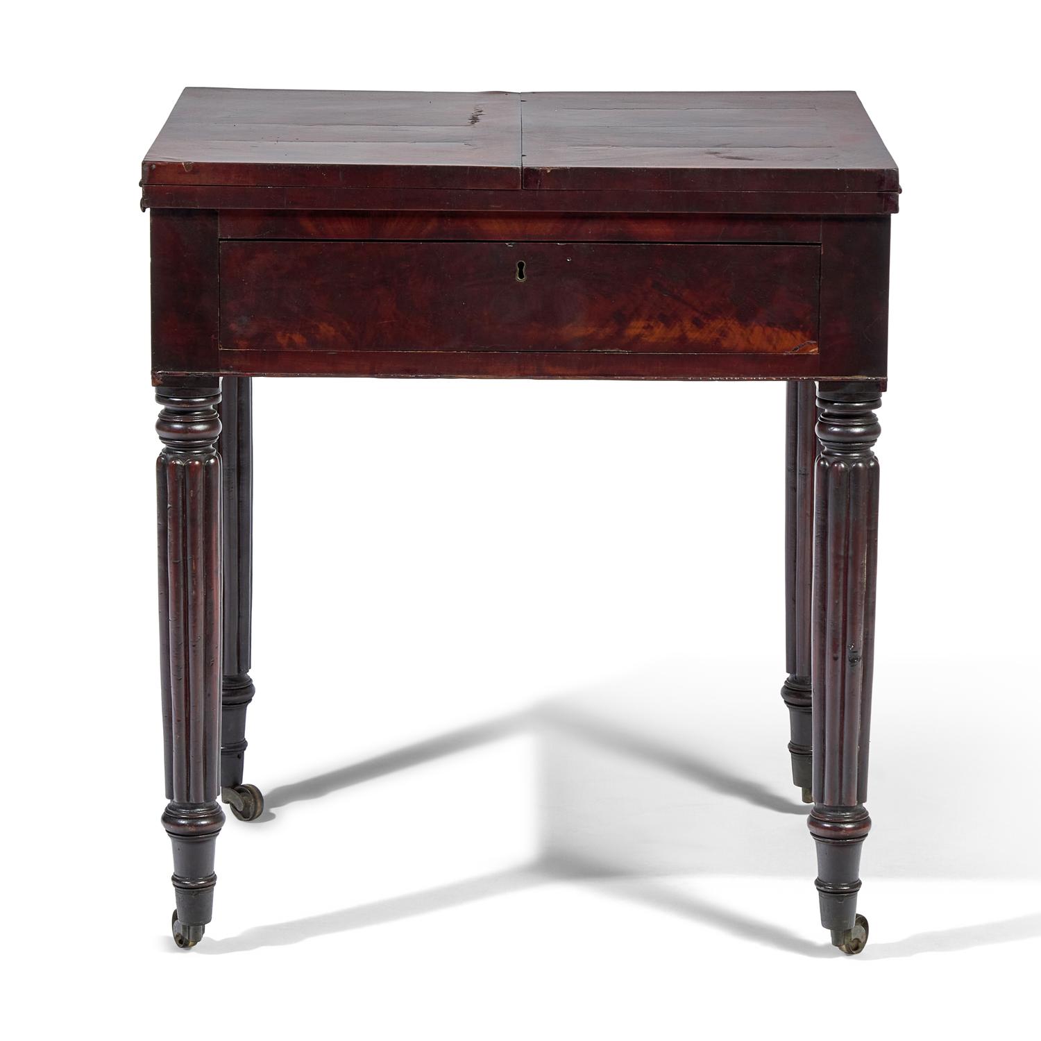 A Late Federal Carved Mahogany Writing Table