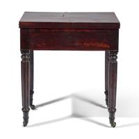 A Late Federal Carved Mahogany Writing Table