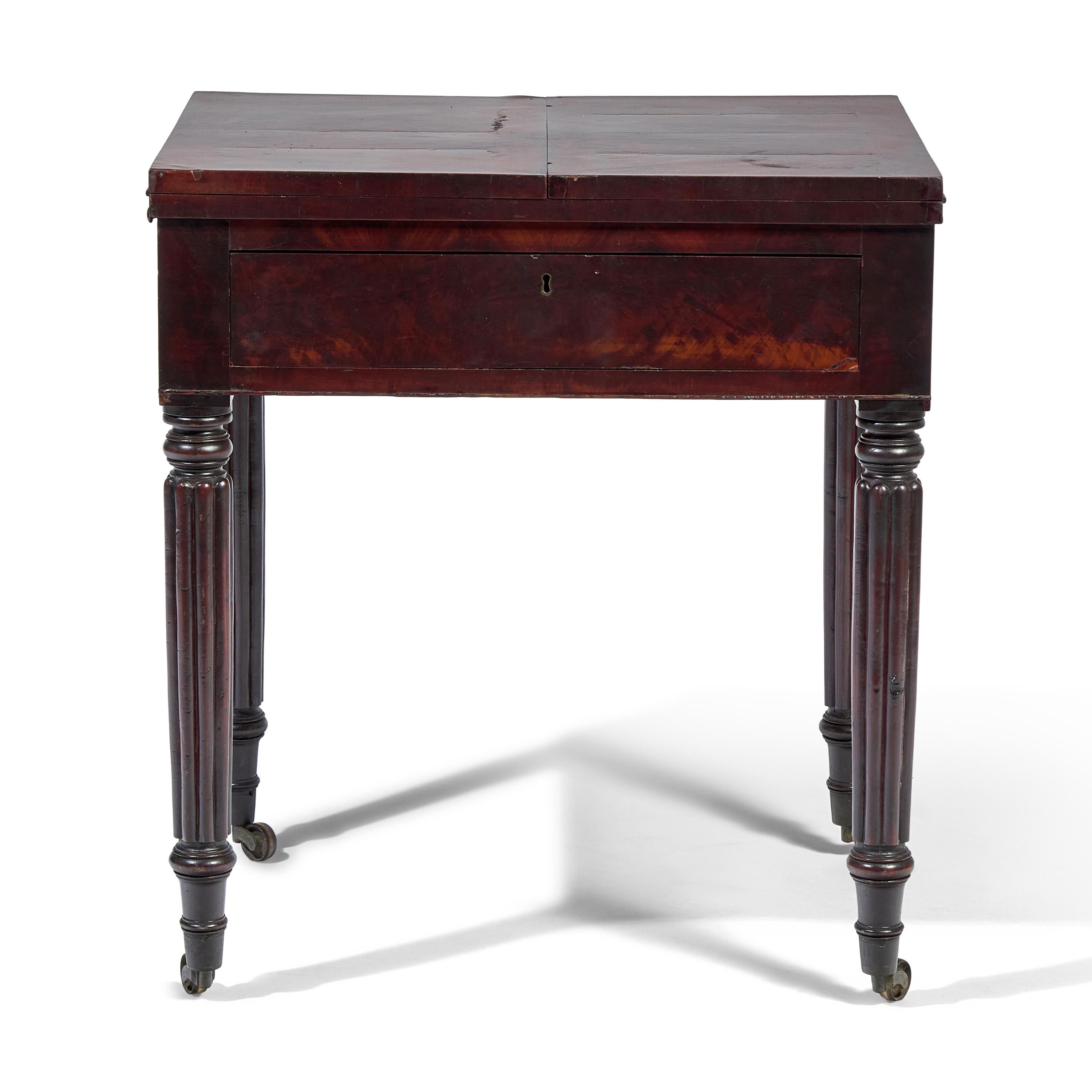 A Late Federal Carved Mahogany Writing Table