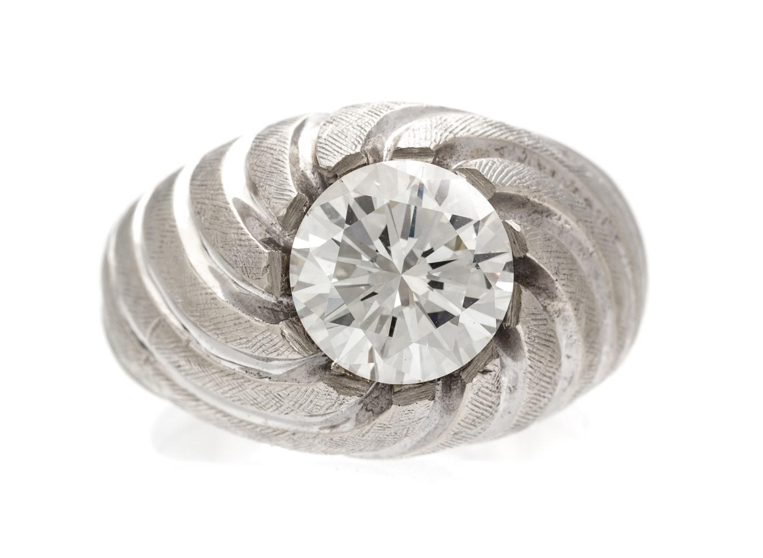 A 14 Karat White Gold and Diamond Ring, 10.15 dwts.