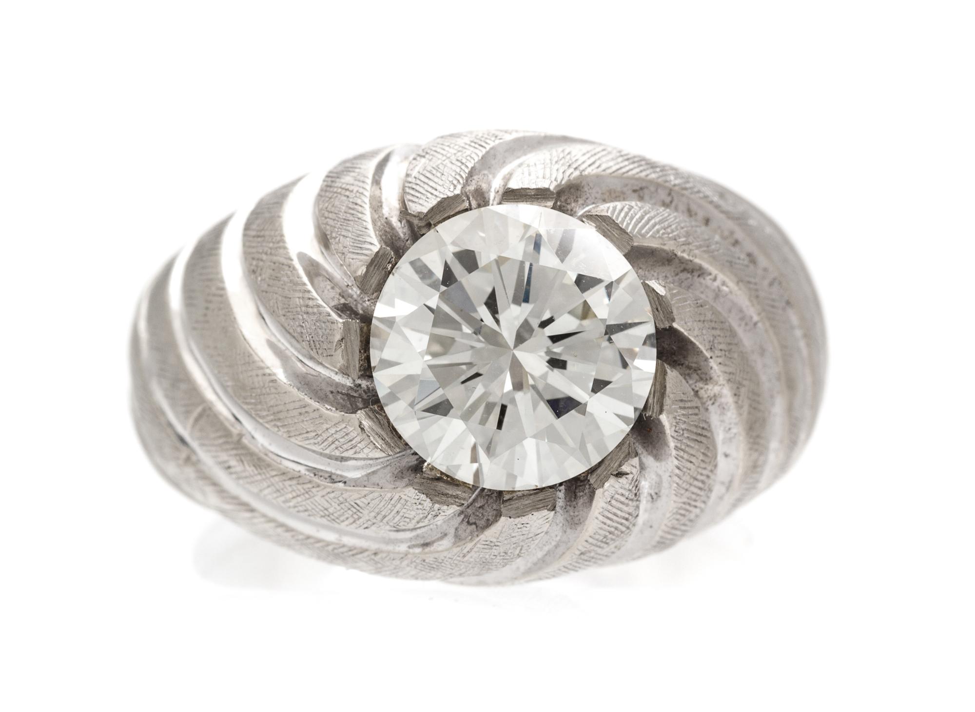 A 14 Karat White Gold and Diamond Ring, 10.15 dwts.