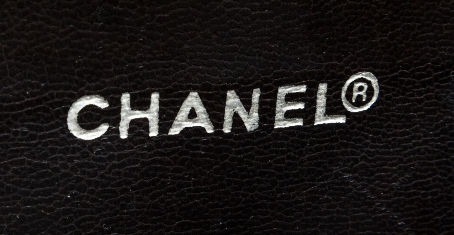 A Chanel Brown Quilted Leather Flap Handbag, 11" x 10" x 3".