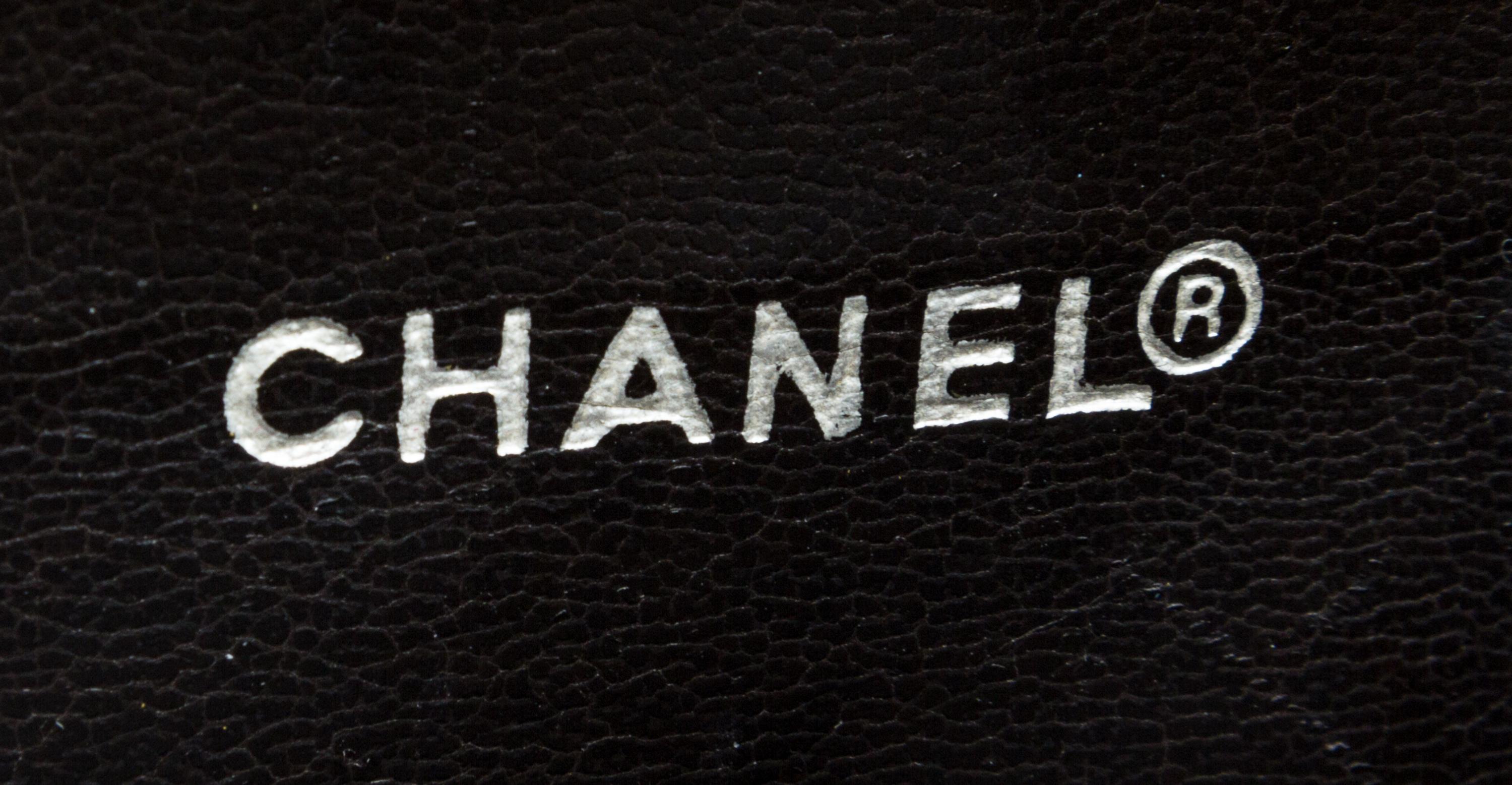 A Chanel Brown Quilted Leather Flap Handbag, 11" x 10" x 3".