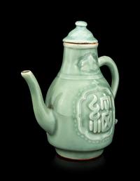 A Longquan Celadon Glazed Porcelain 'Longevity' Teapot