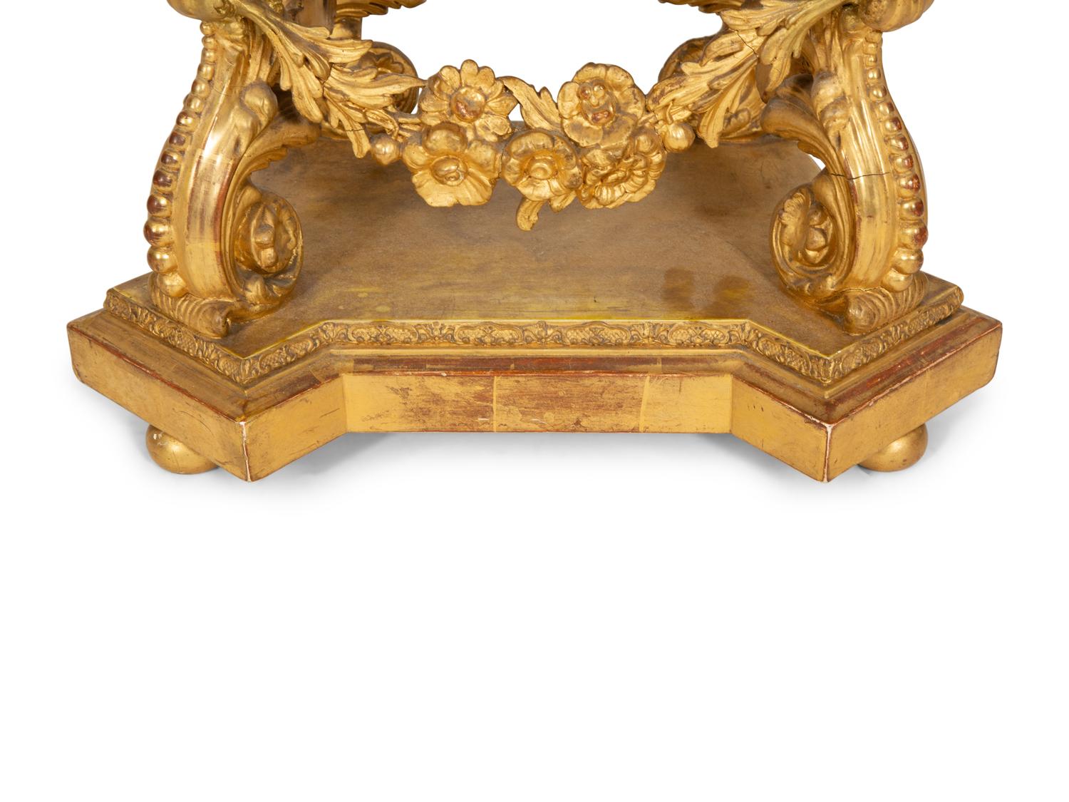 A Georgian Carved, Painted and Parcel Gilt Shaped Pedestal Base