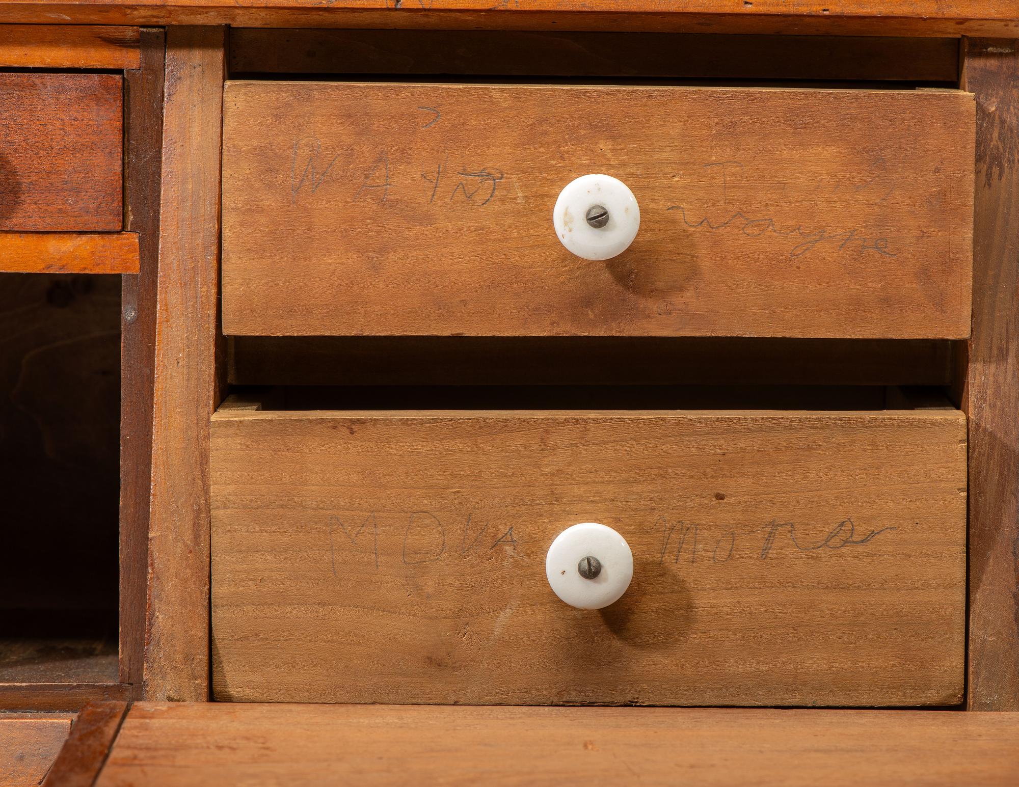 A Late Classical Parcel Gilt Desk Cupboard