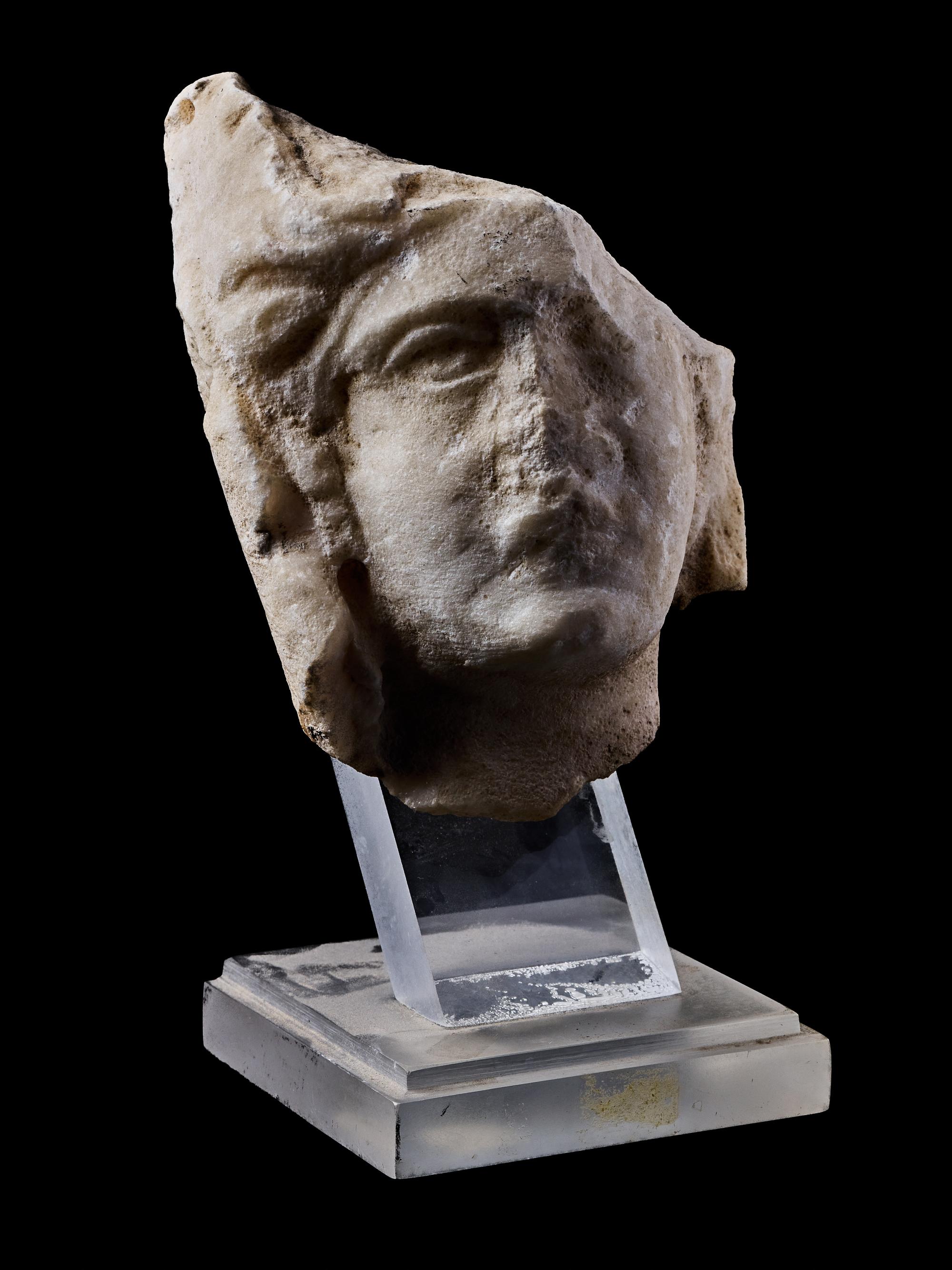 A Roman Marble Head of a Veiled Woman