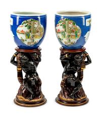 A Pair of Chinese Porcelain Jardinieres on Venetian Figural Pedestals