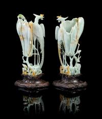 A Pair of Unusual Large Chinese Greenish-White Jadeite Phoenix Birds and Vase Group LATE QING DYNASTY Height of taller 15 inches. — LATE QING DYNASTY