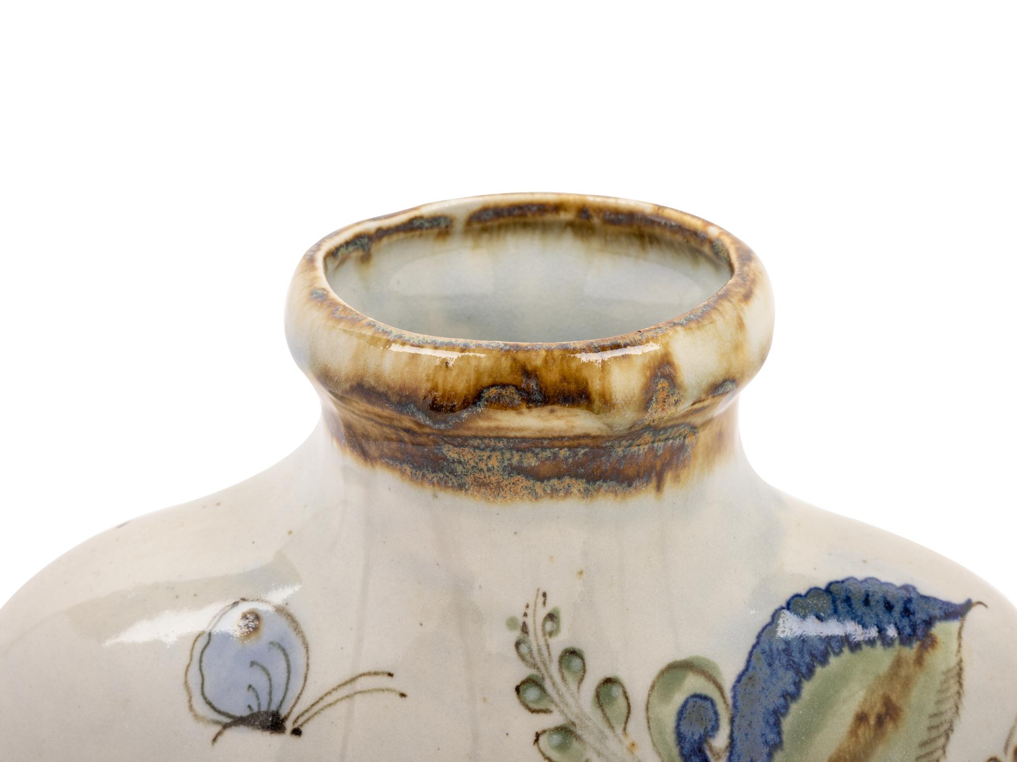 A Mexican Glazed Terra Cotta Vase