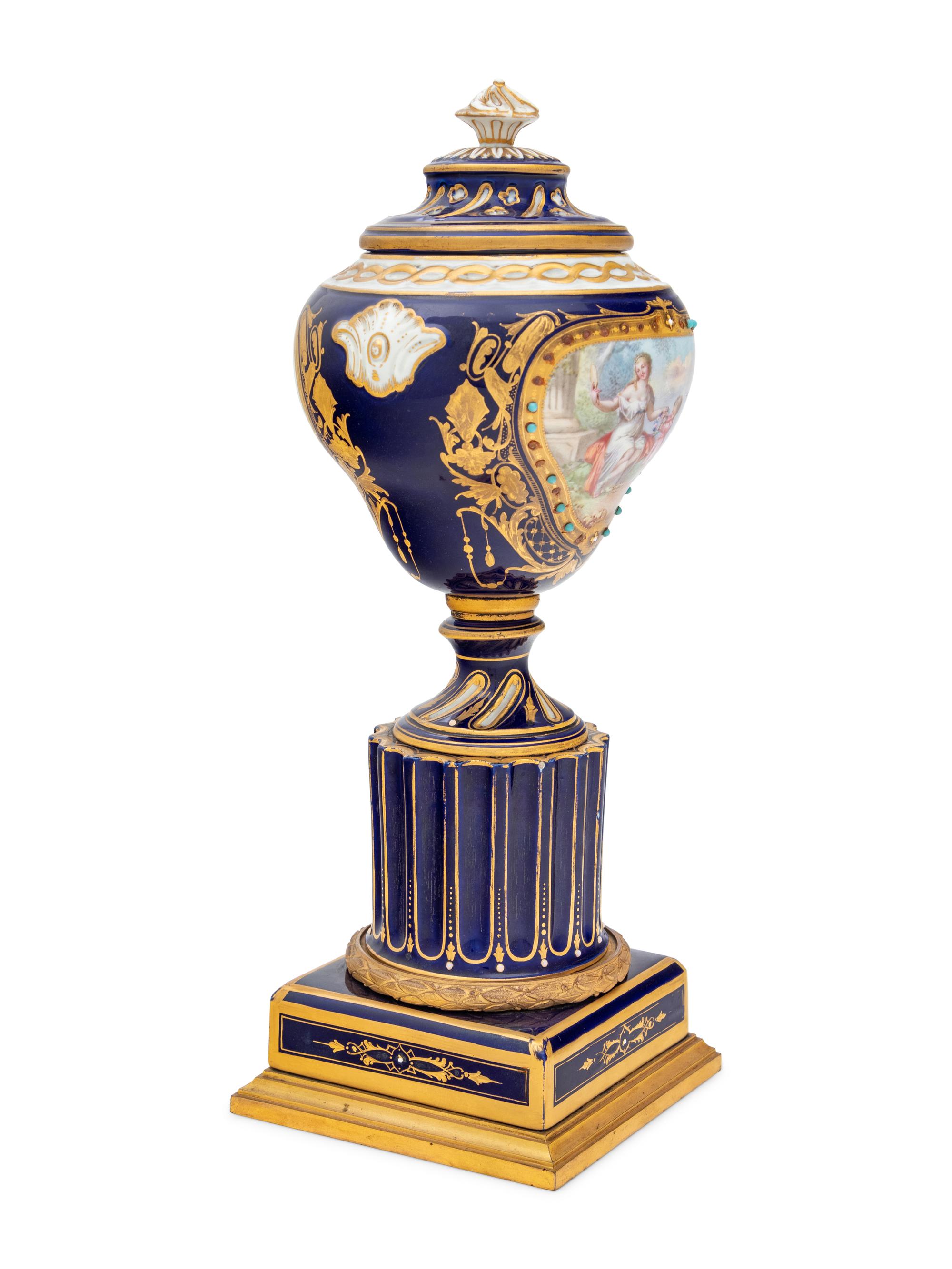 A Sèvres Style Painted and Parcel Gilt Porcelain Urn