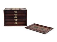 A Chinese Hardwood and Bone Mah Jong Set