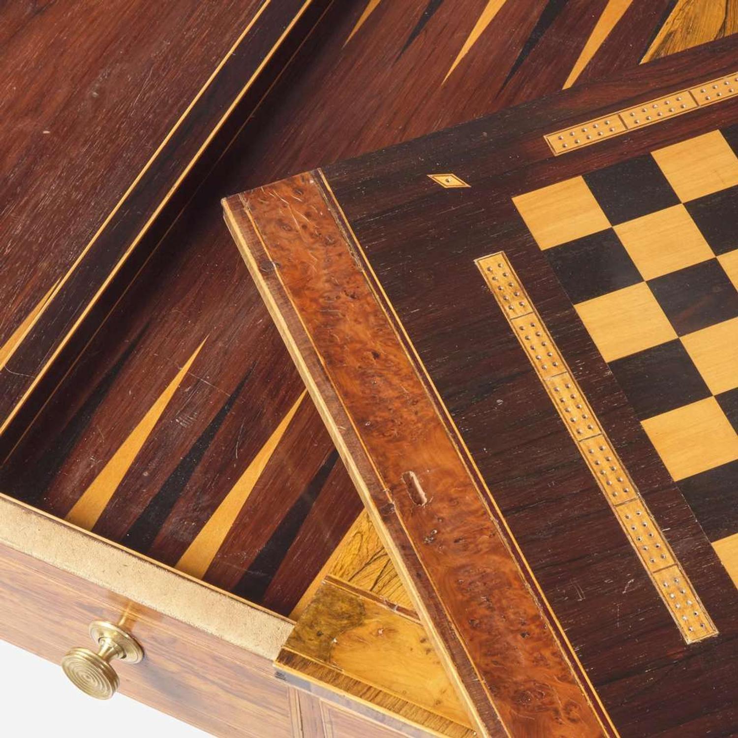 A Regency inlaid rosewood and yew sofa table circa 1810