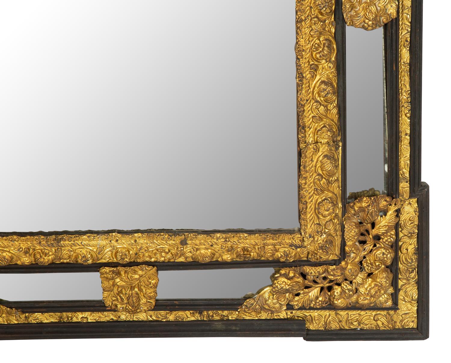 A Régence Style Pressed Brass Mirror