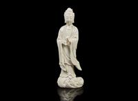 A Chinese Dehua blanc de Chine figure of Guanyin, Boji Yuren impressed mark 德化瓷觀音 博及漁人款