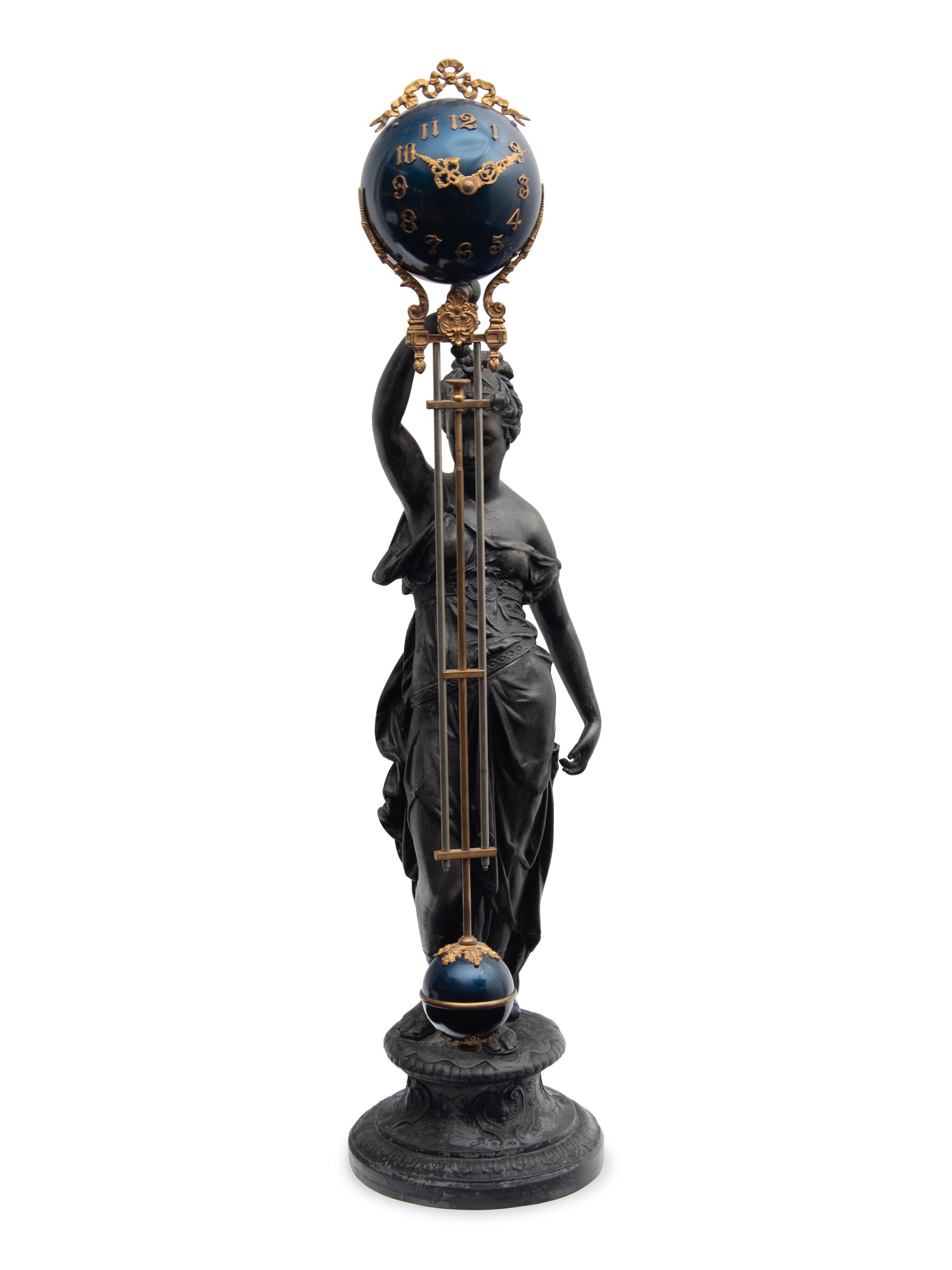 A Continental Cast Metal and Enameled Figural Pendulum Clock