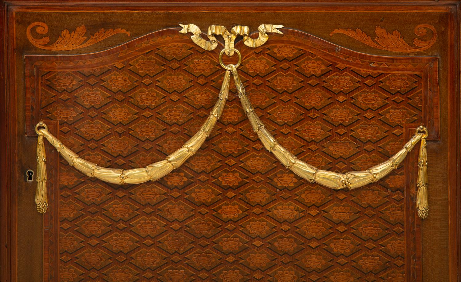 A Louis XVI Style Gilt Bronze Mounted Parquetry Marble-Top Commode