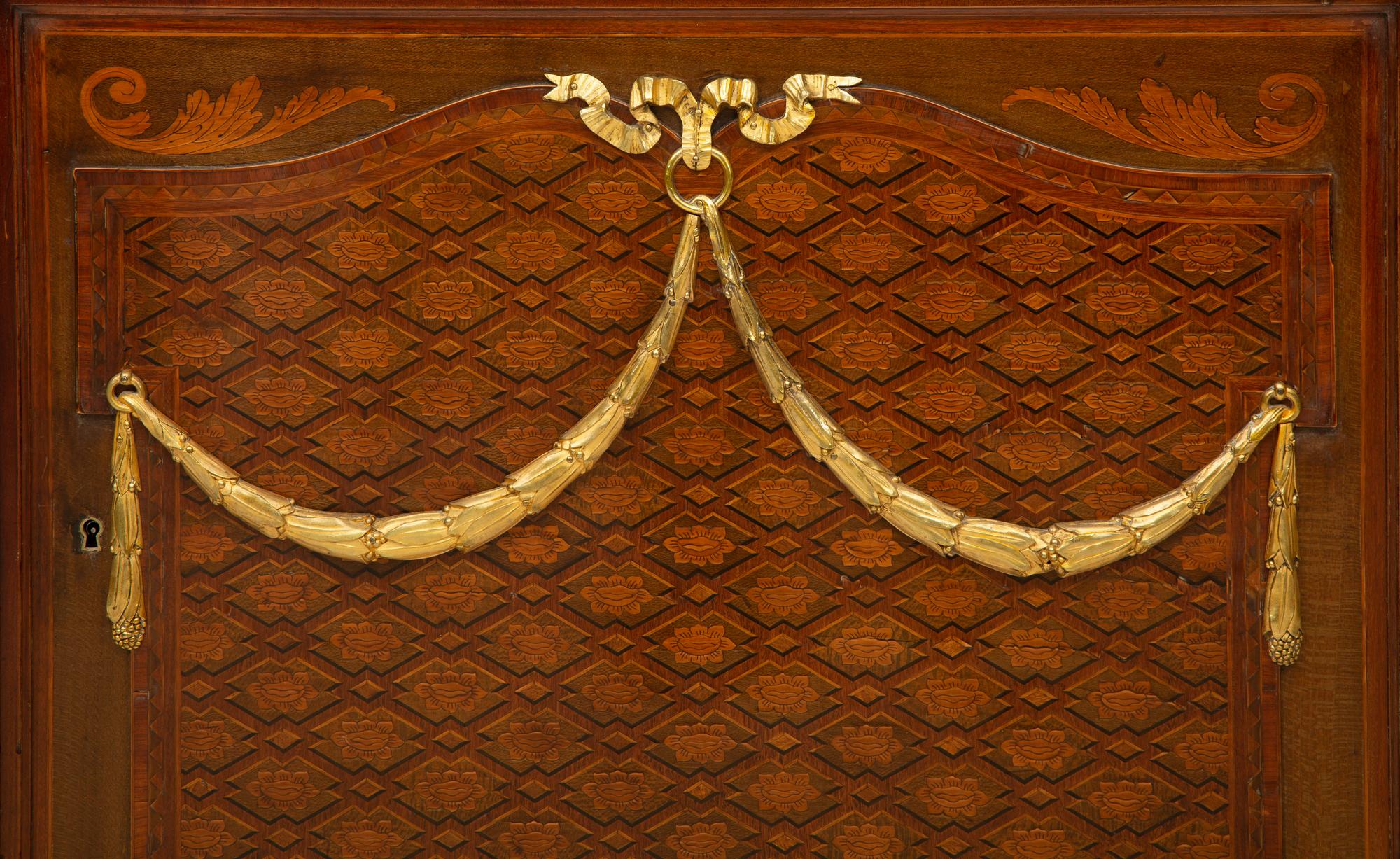 A Louis XVI Style Gilt Bronze Mounted Parquetry Marble-Top Commode