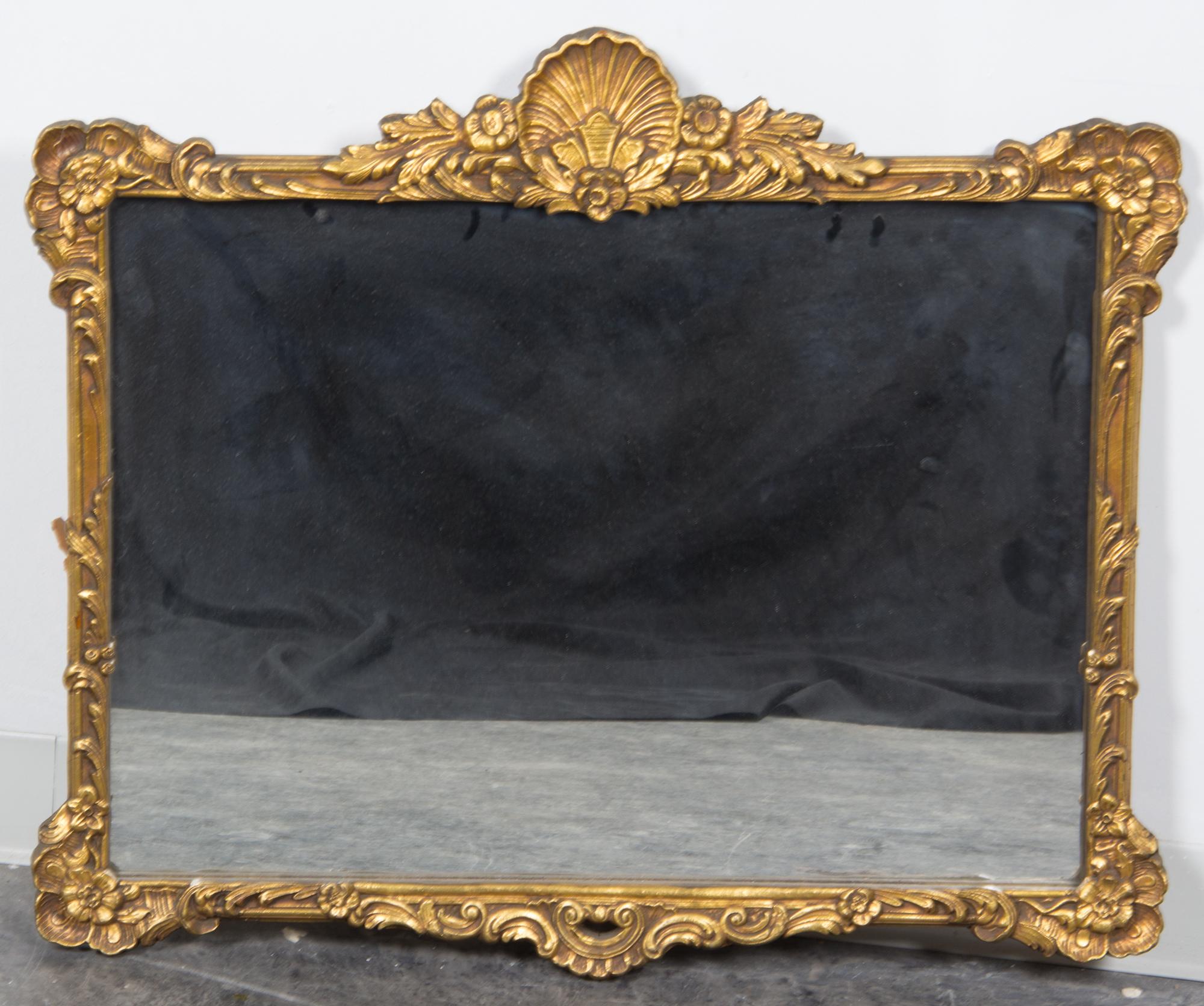 A Giltwood Mirror Height 27 1/4 x width 31 1/2 inches.