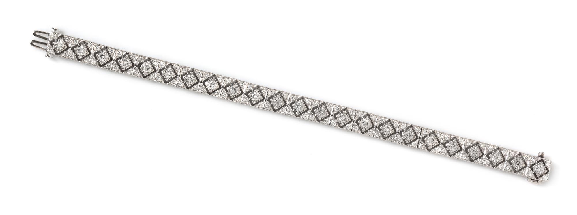 A 14 Karat White Gold and Diamond Bracelet, 18.15 dwts.