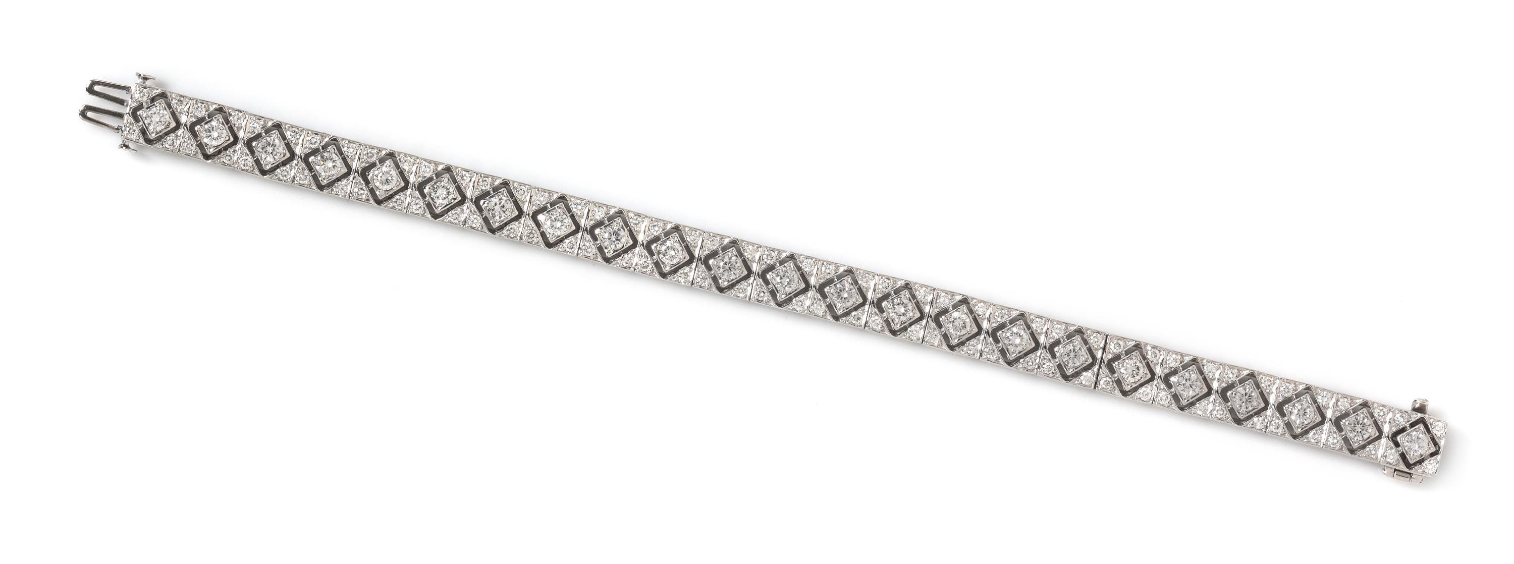 A 14 Karat White Gold and Diamond Bracelet, 18.15 dwts.